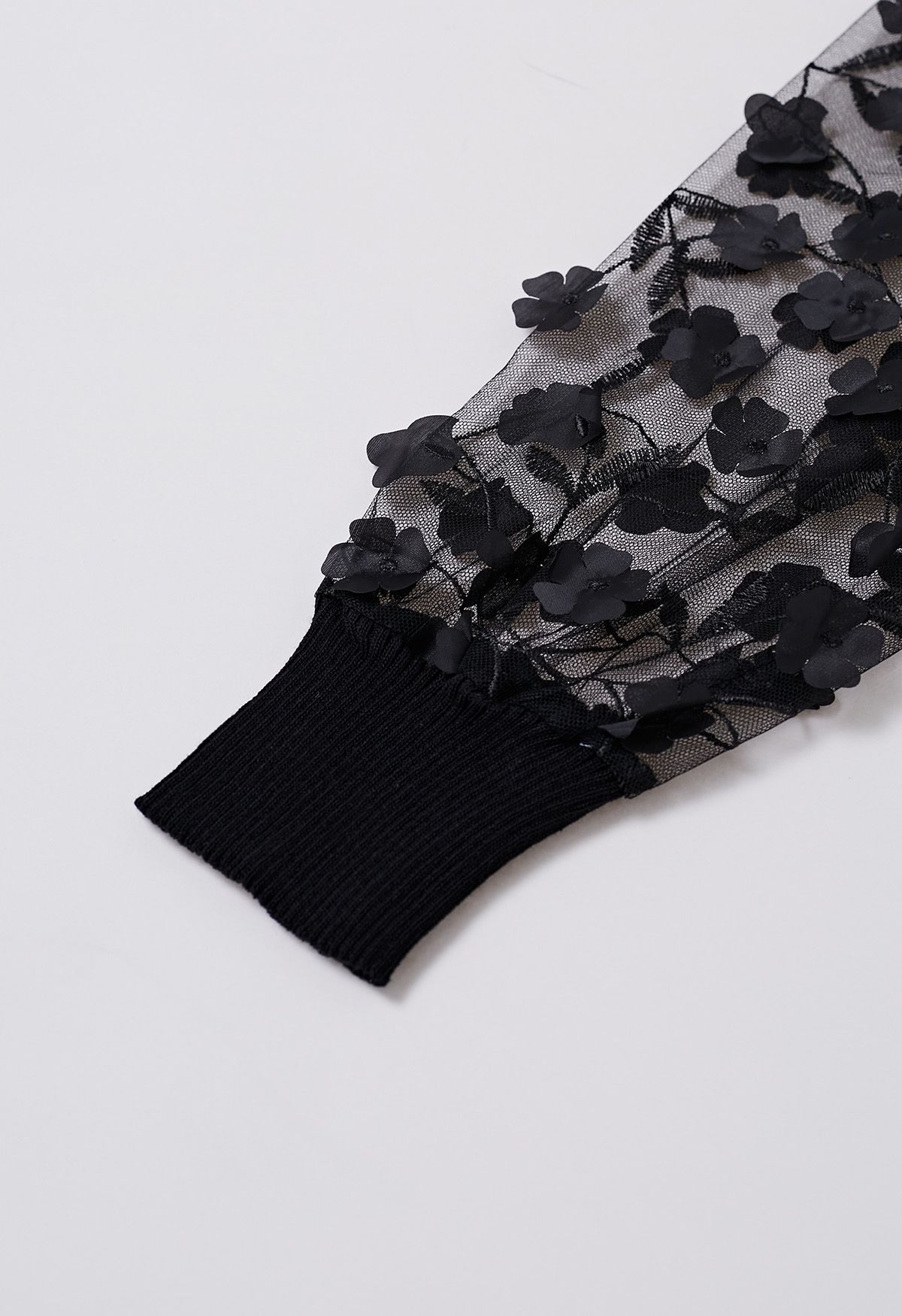 Haut en tricot épissé à manches en maille Floret 3D en noir