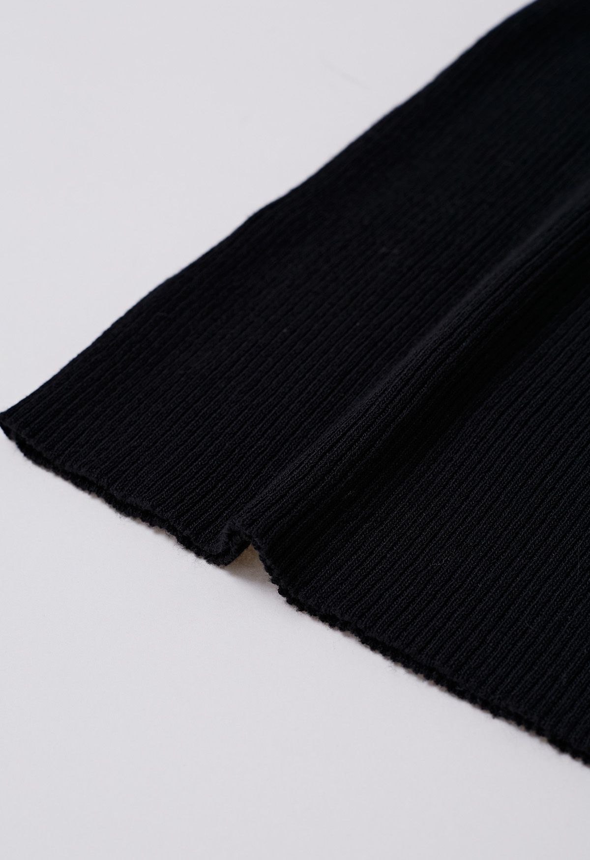 Haut en tricot épissé à manches en maille Floret 3D en noir