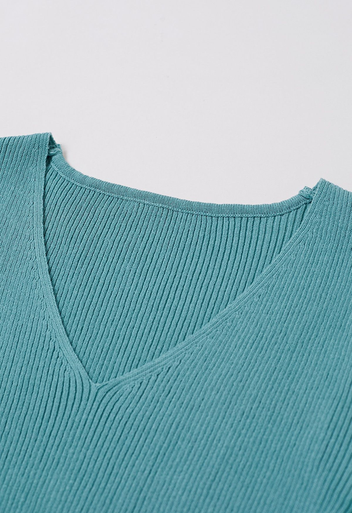 Haut en tricot épissé à manches en maille Floret 3D en bleu sarcelle
