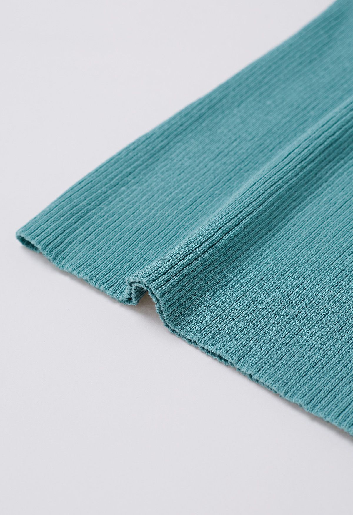 Haut en tricot épissé à manches en maille Floret 3D en bleu sarcelle