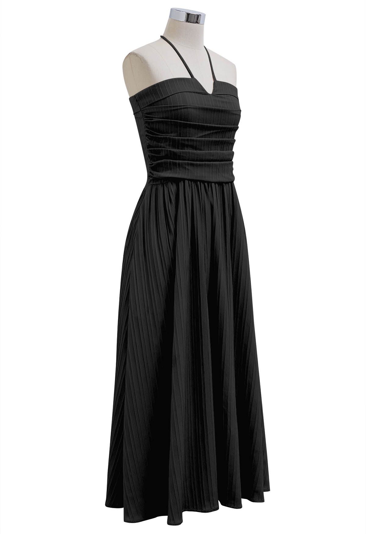 Robe mi-longue dos nu froncée au dos en noir