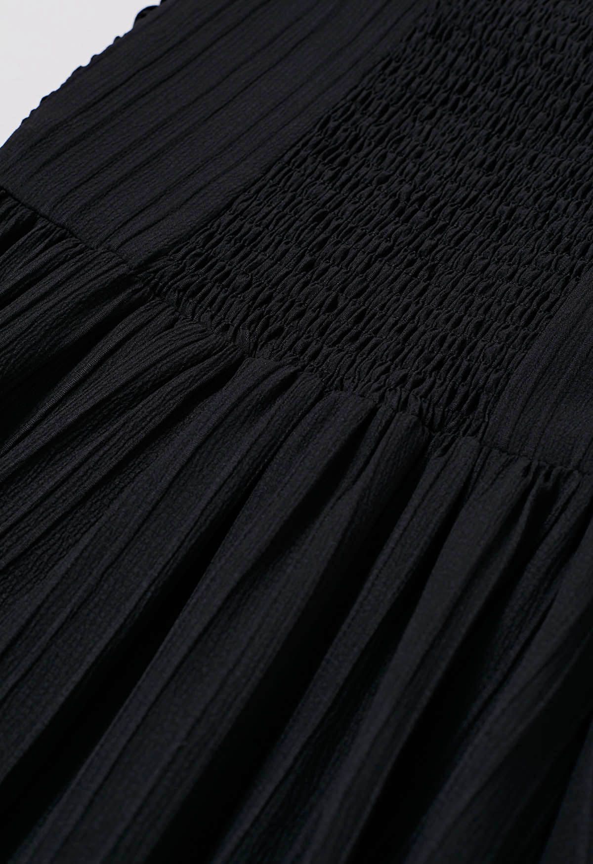 Robe mi-longue dos nu froncée au dos en noir