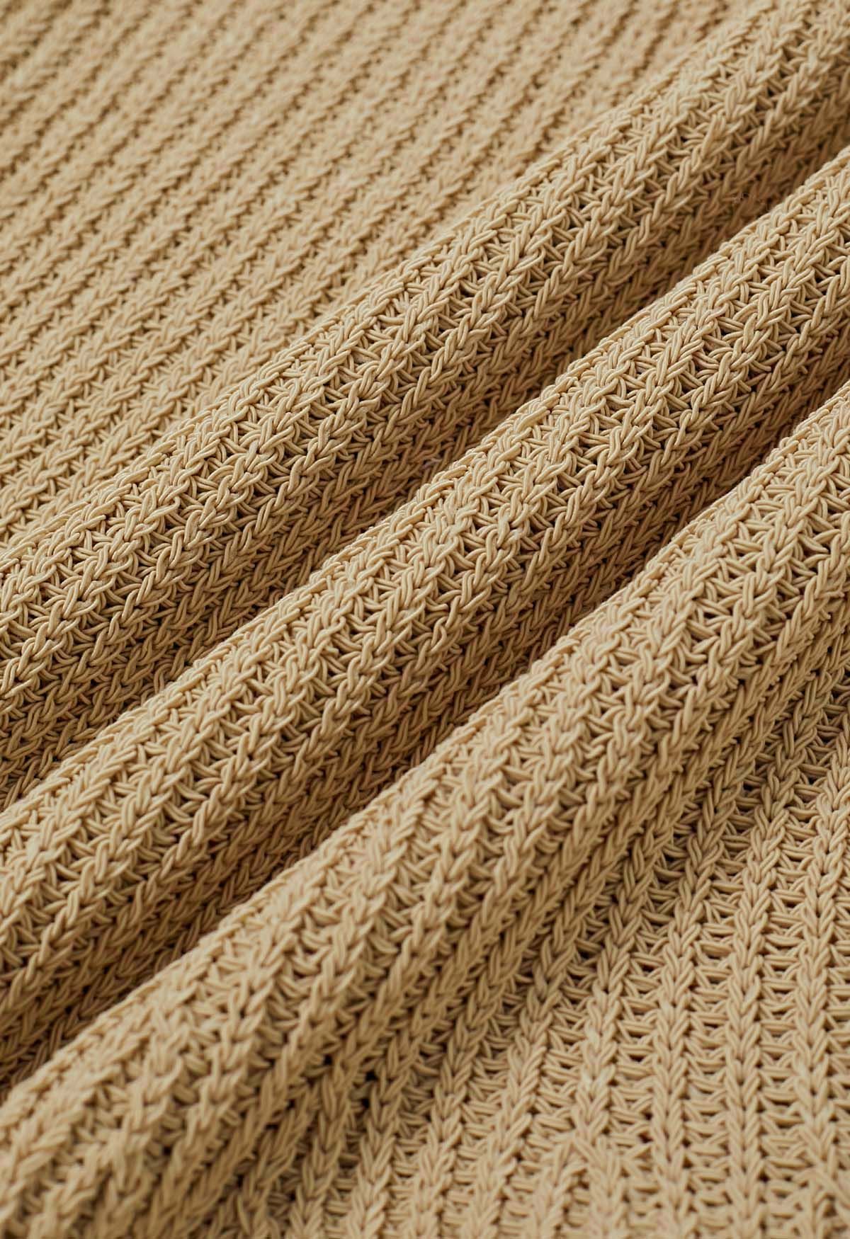 Haut en tricot sans manches à col rond et ourlet volanté en beige clair