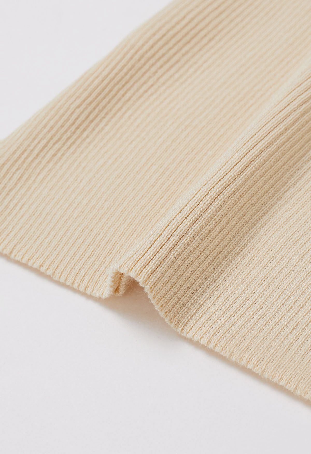 Haut en tricot froncé à poignets évasés en organza crème