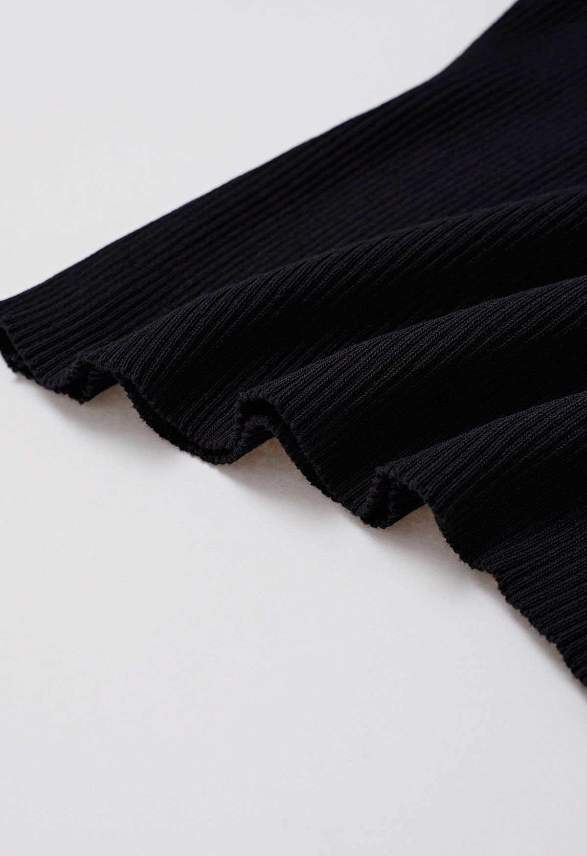 Haut en tricot froncé à poignets évasés en organza noir
