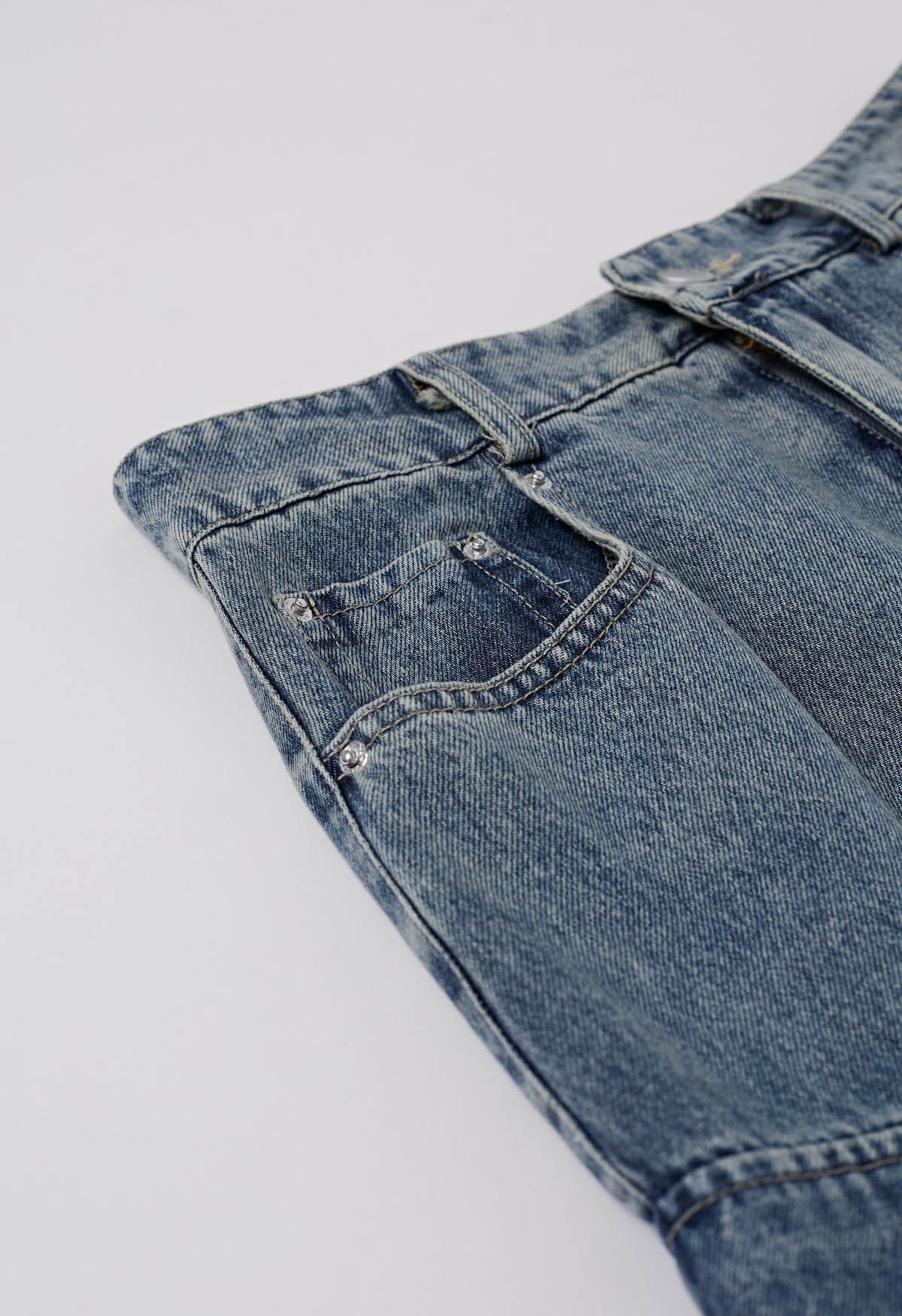 Jupe évasée en jean ceinturée avec poche et bordure en bleu