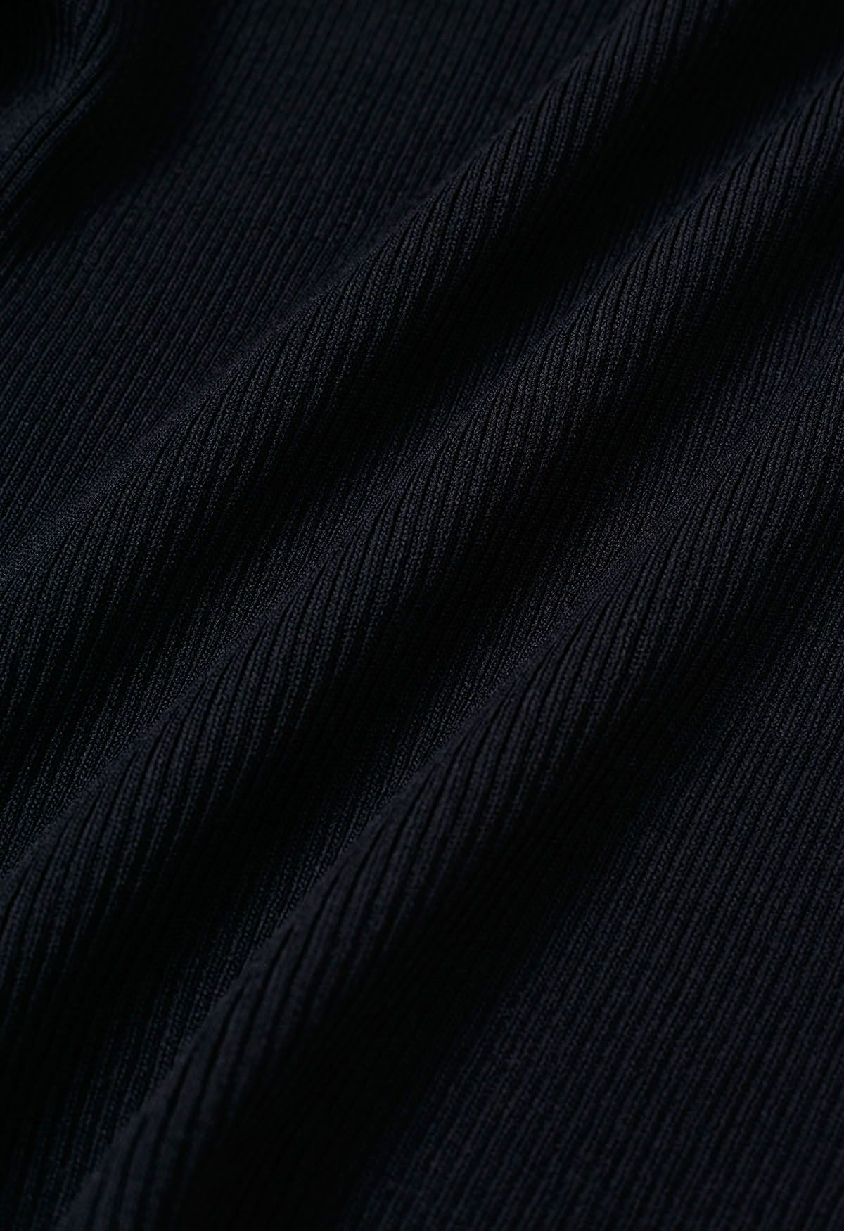 Haut en tricot épissé à manches flottantes en dentelle découpée en noir