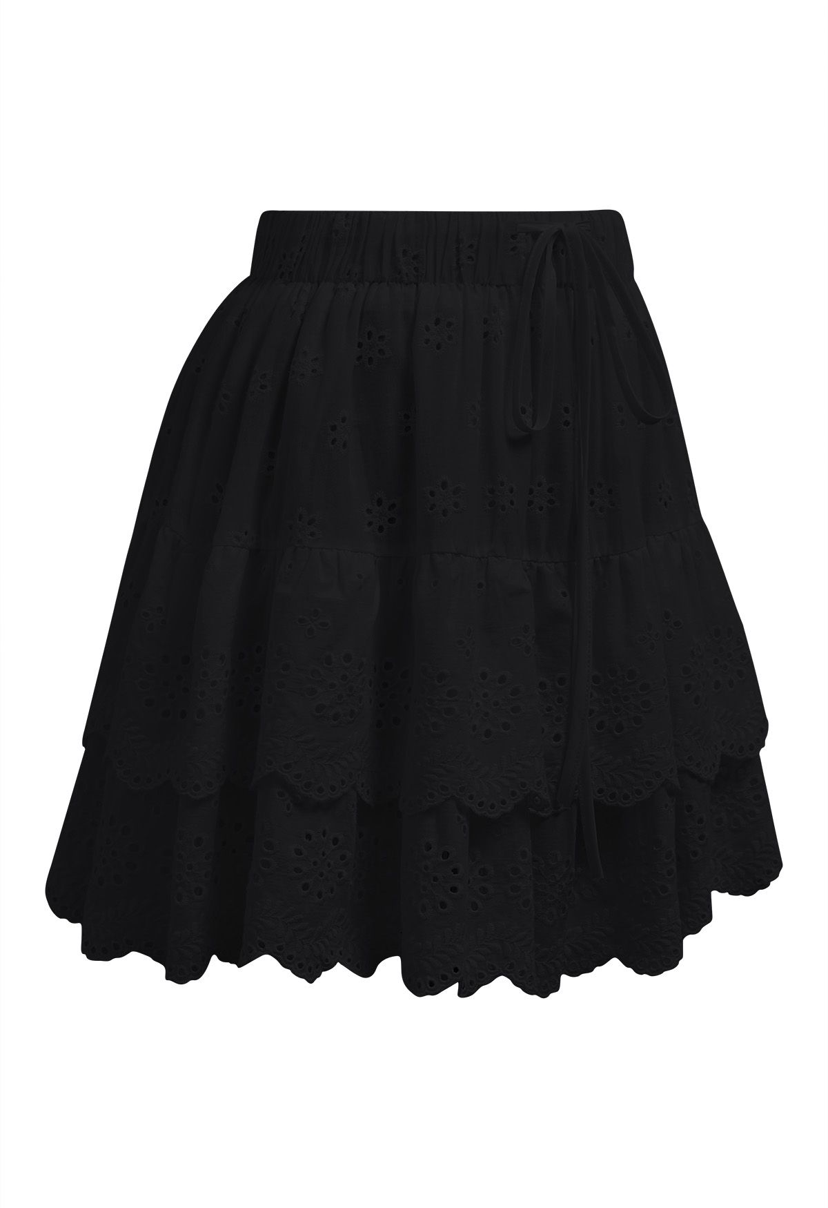 Mini-jupe à volants brodée d'œillets en noir