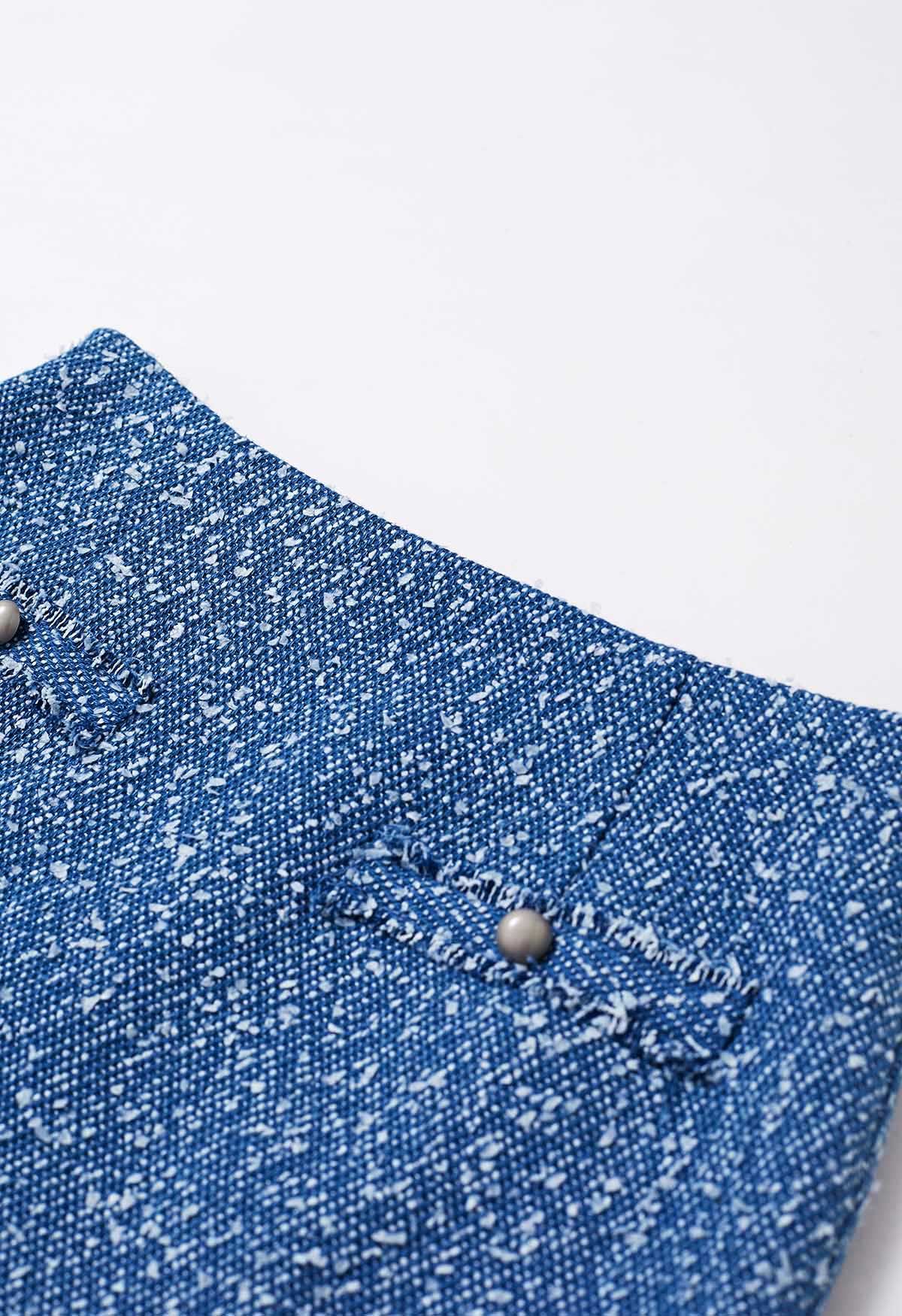 Mini-jupe en tweed boutonnée de couleurs mélangées en bleu