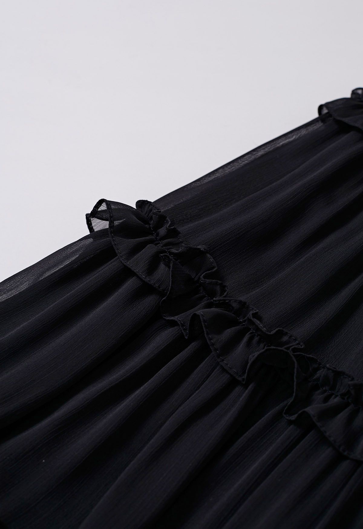 Adorable jupe longue évasée à volants en noir