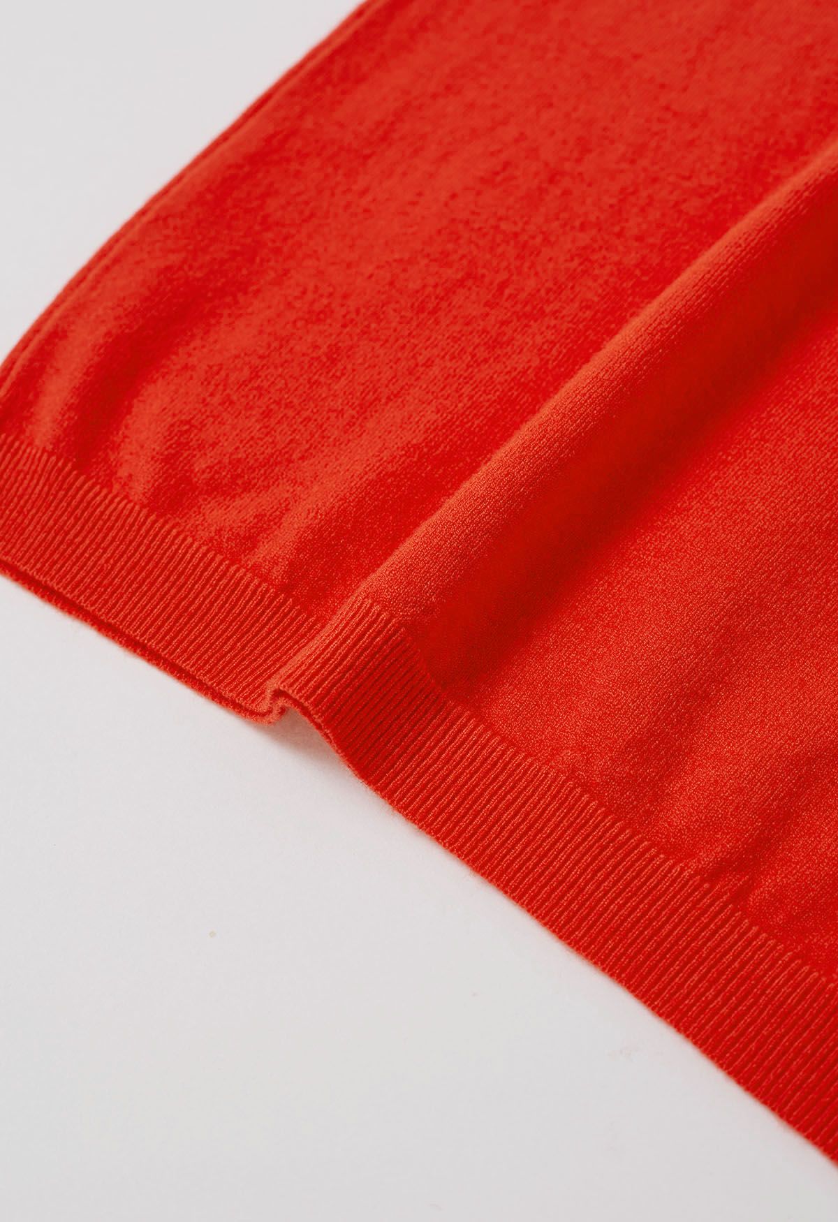 Haut en tricot à manches courtes de couleur unie en orange