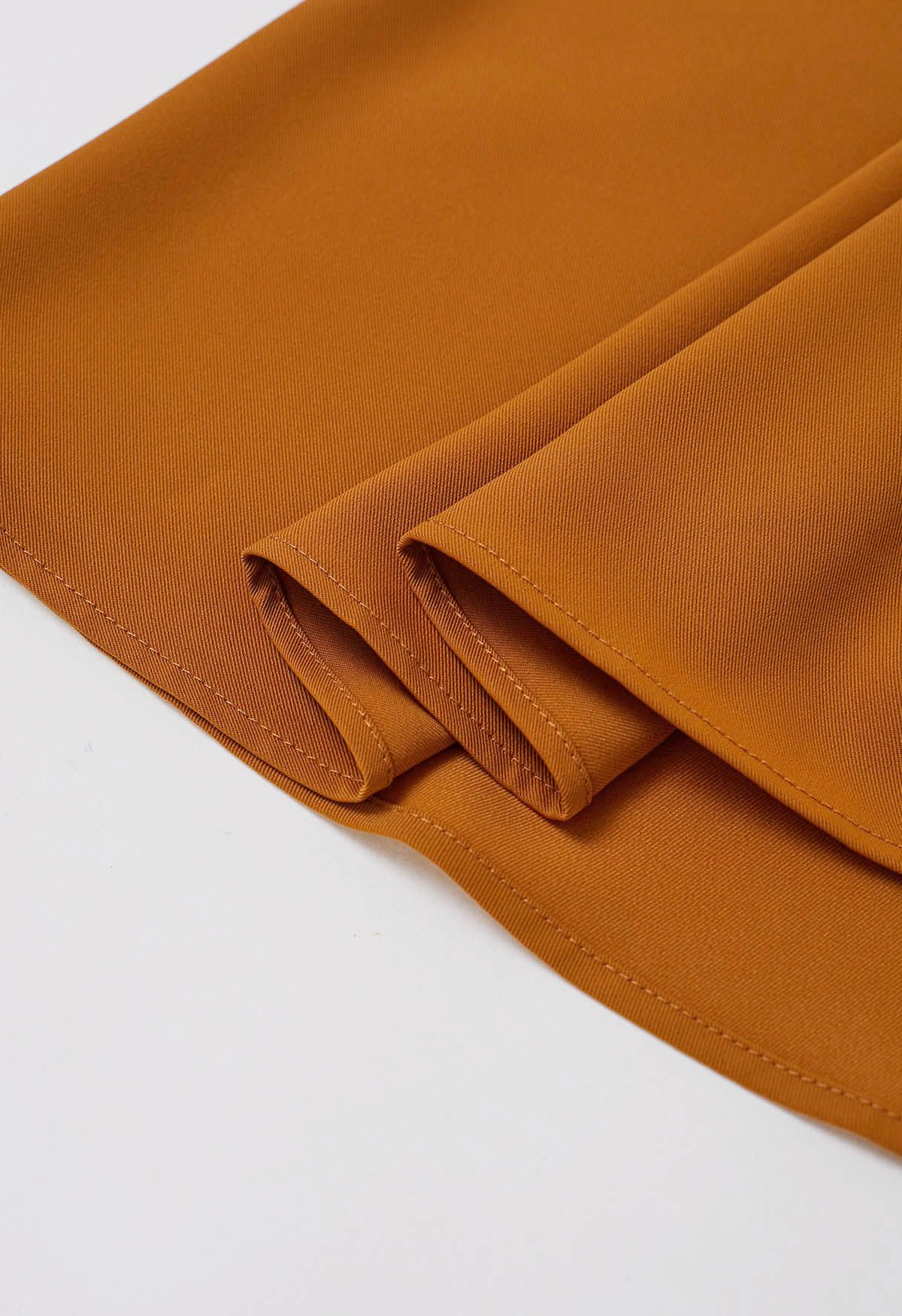 Jupe mi-longue raffinée à ceinture plissée en orange