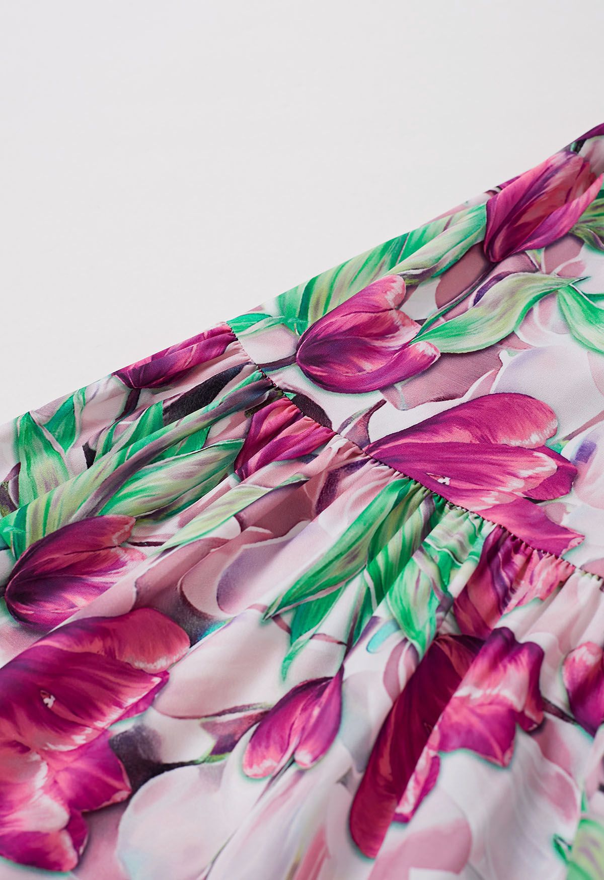 Robe mi-longue vibrante à manches bulles et tulipes en rose