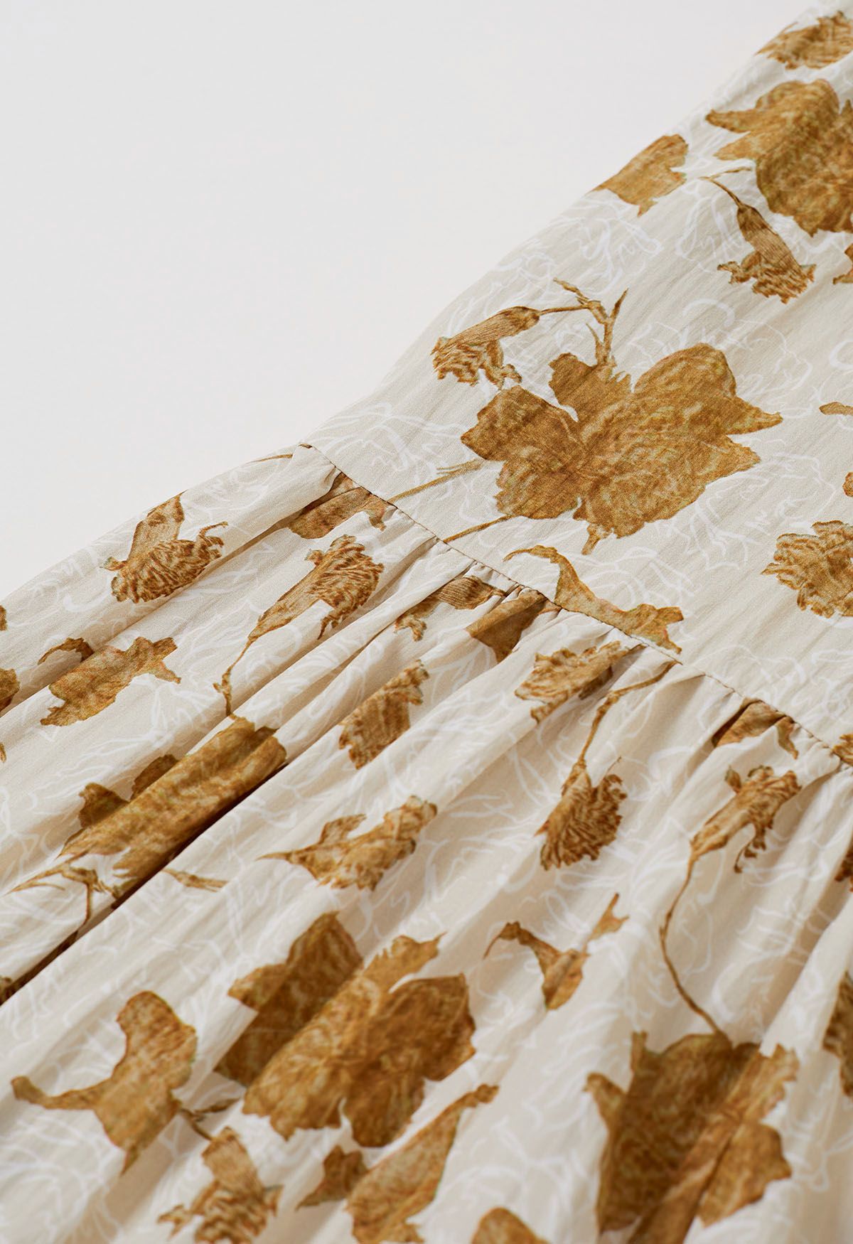 Robe longue caraco à imprimé floral en caramel