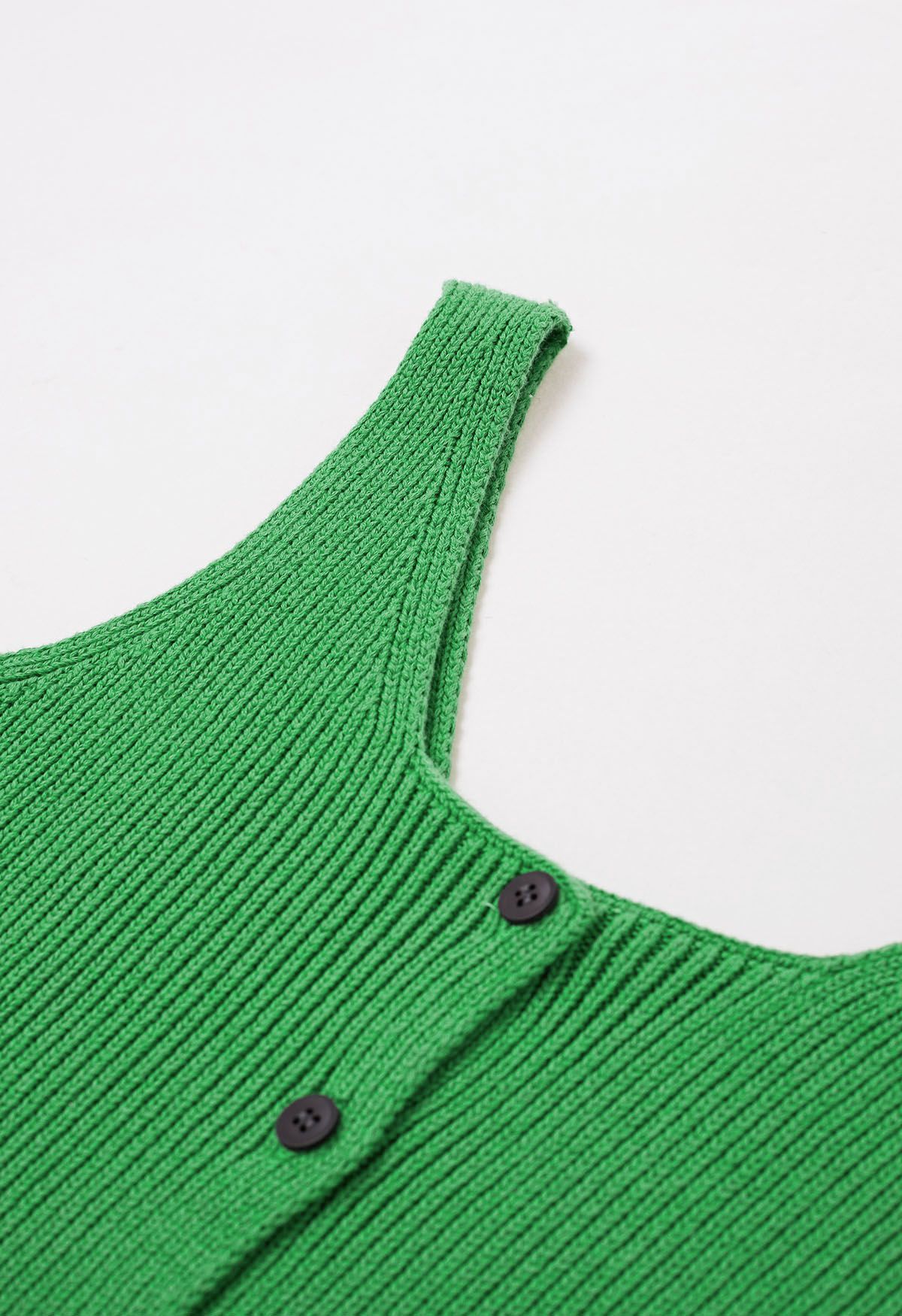 Top court boutonné en tricot sans manches en vert