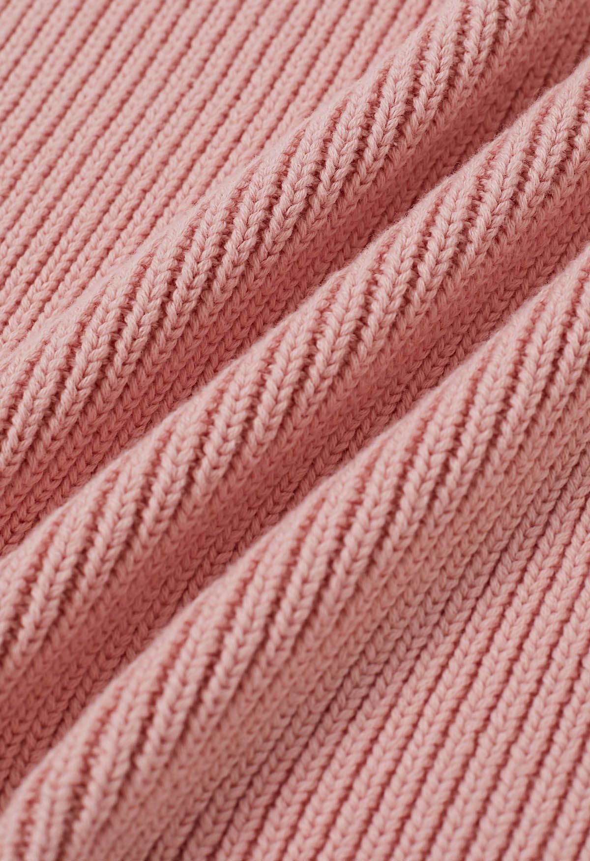 Top court boutonné en tricot sans manches en rose