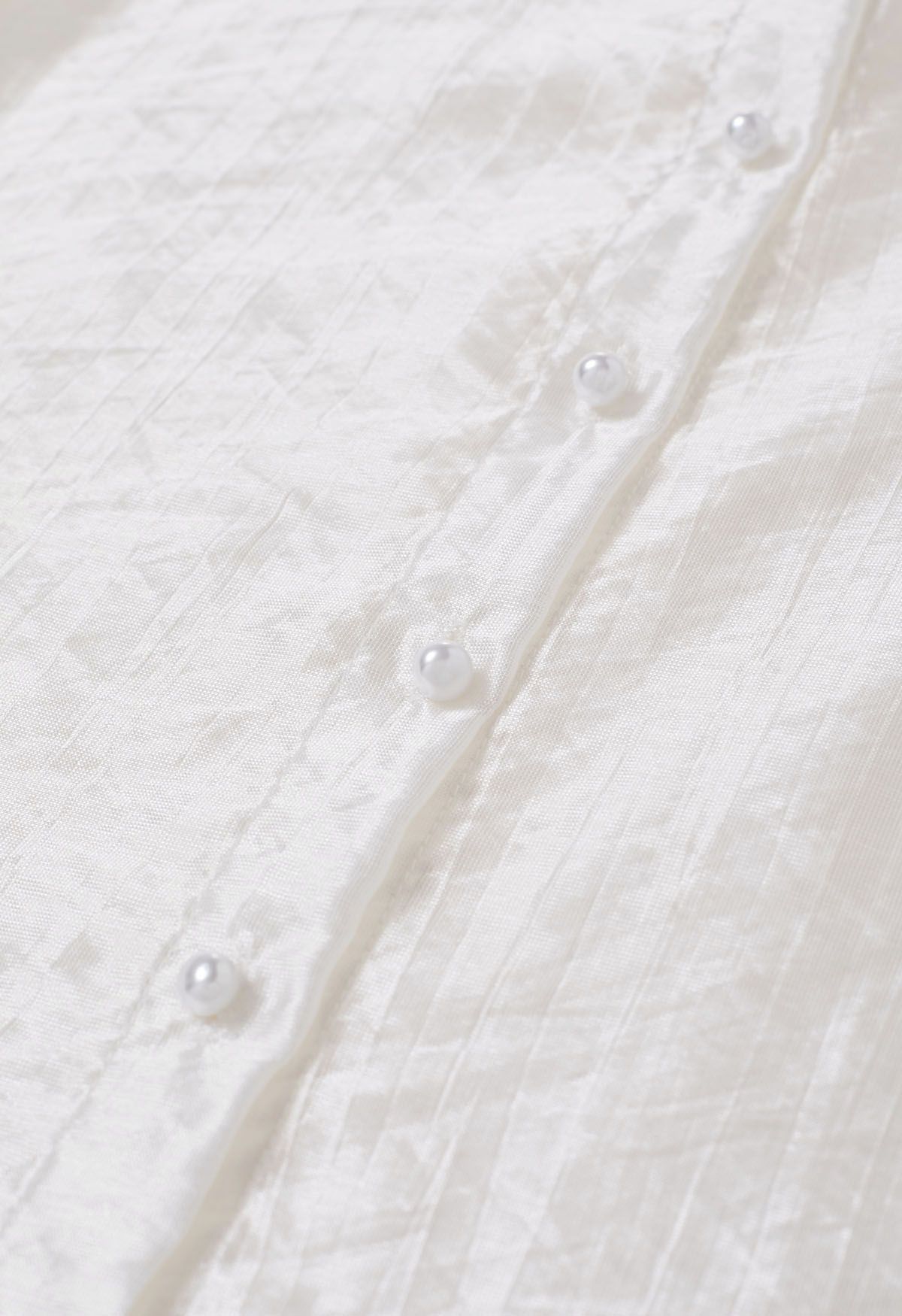 Chemise avec nœud à nouer en satin texturé en blanc