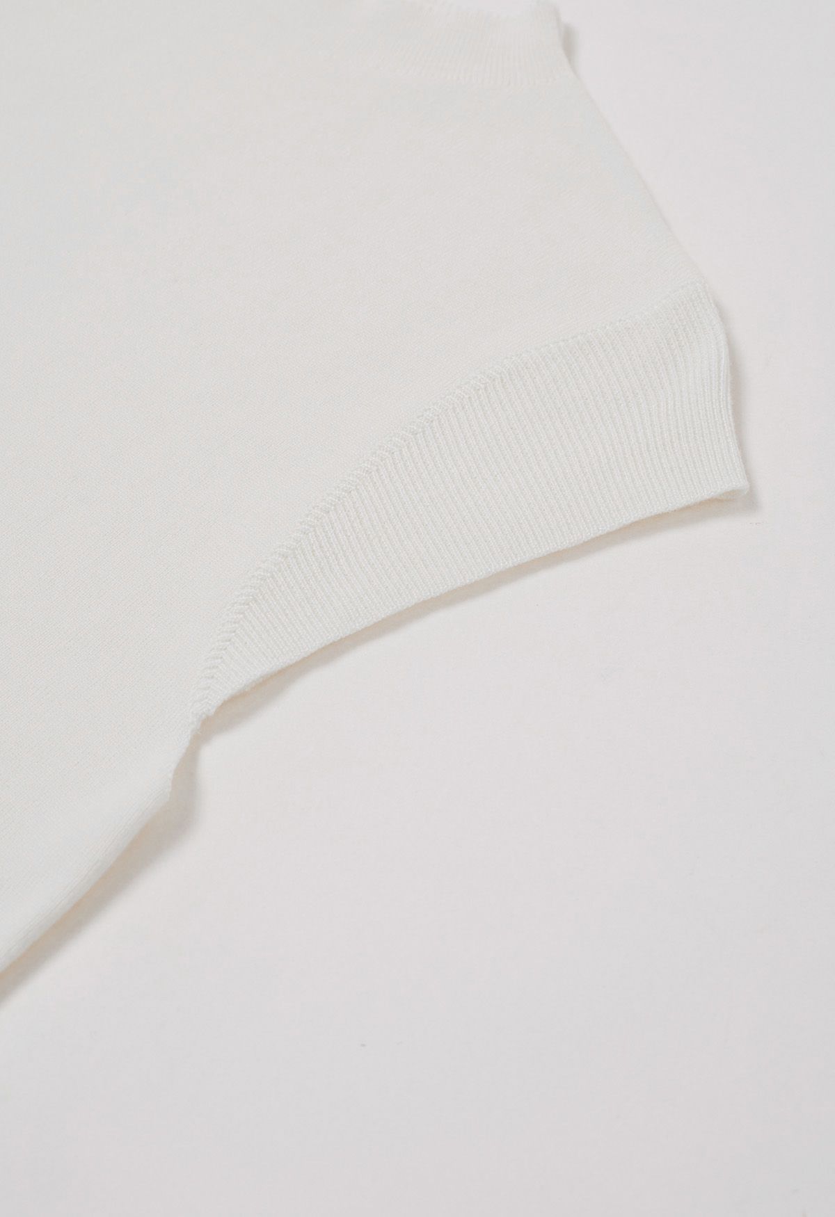 Haut en tricot à col montant avec cordon de serrage au dos en blanc