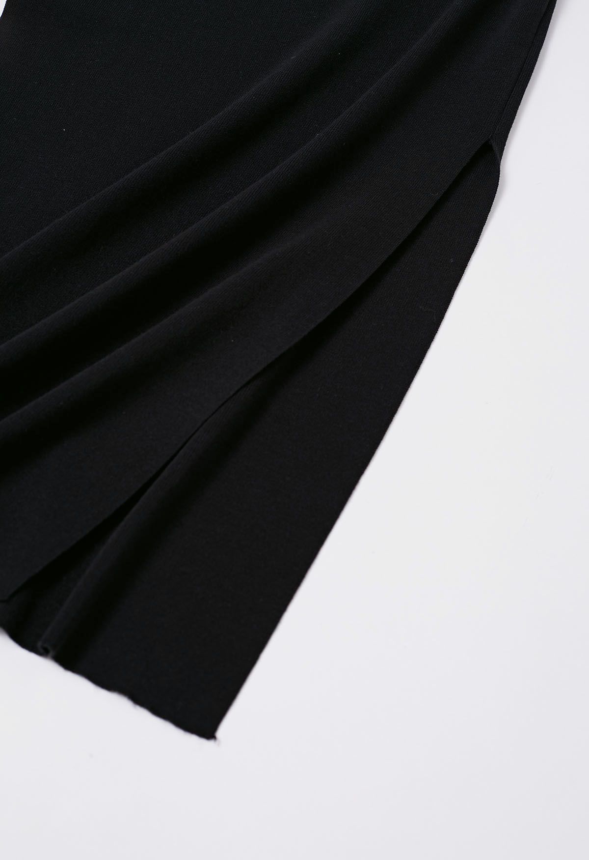 Robe en tricot moulante à encolure nœud papillon sur le côté en noir