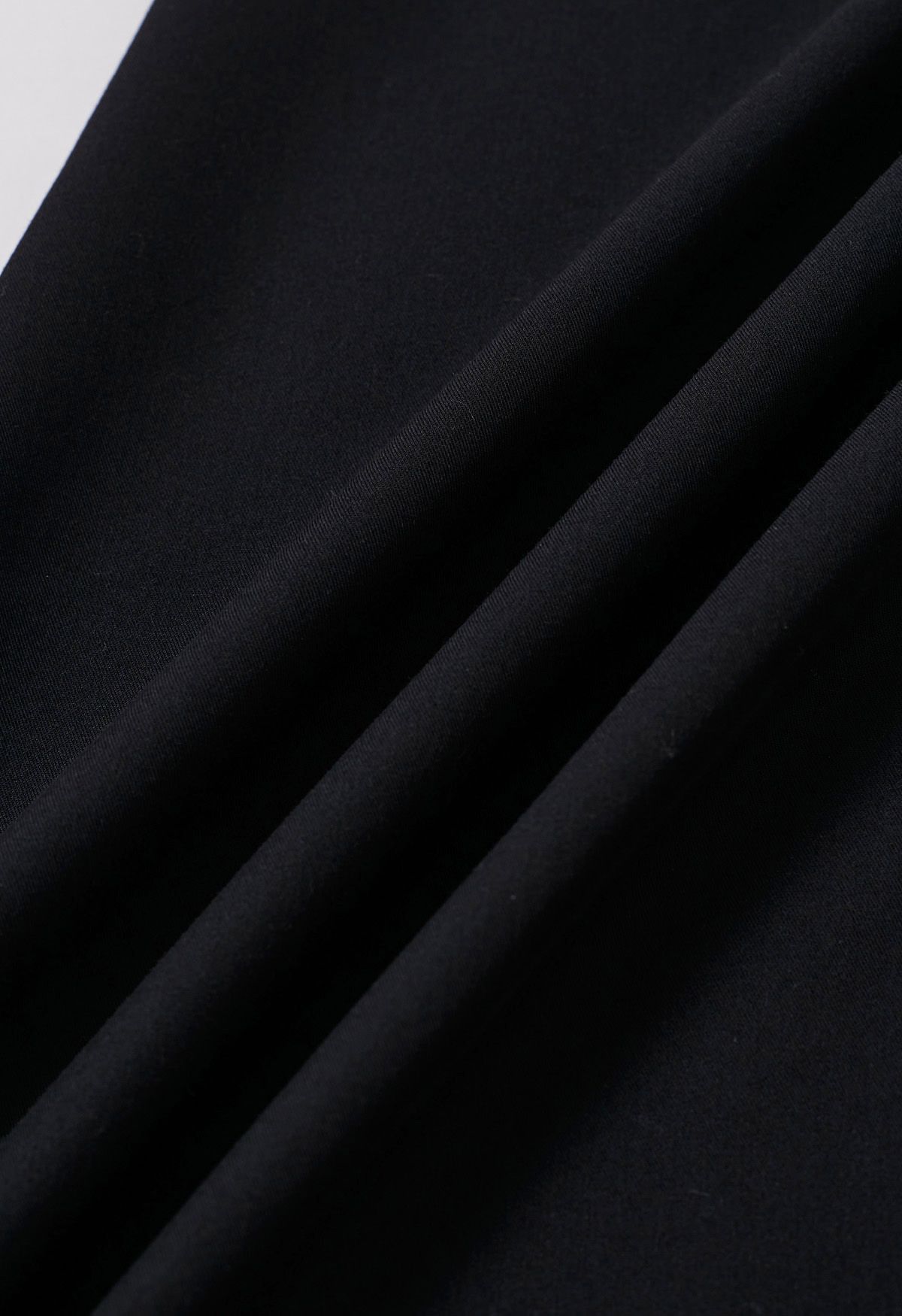 Jupe longue à taille plissée contrastée en noir