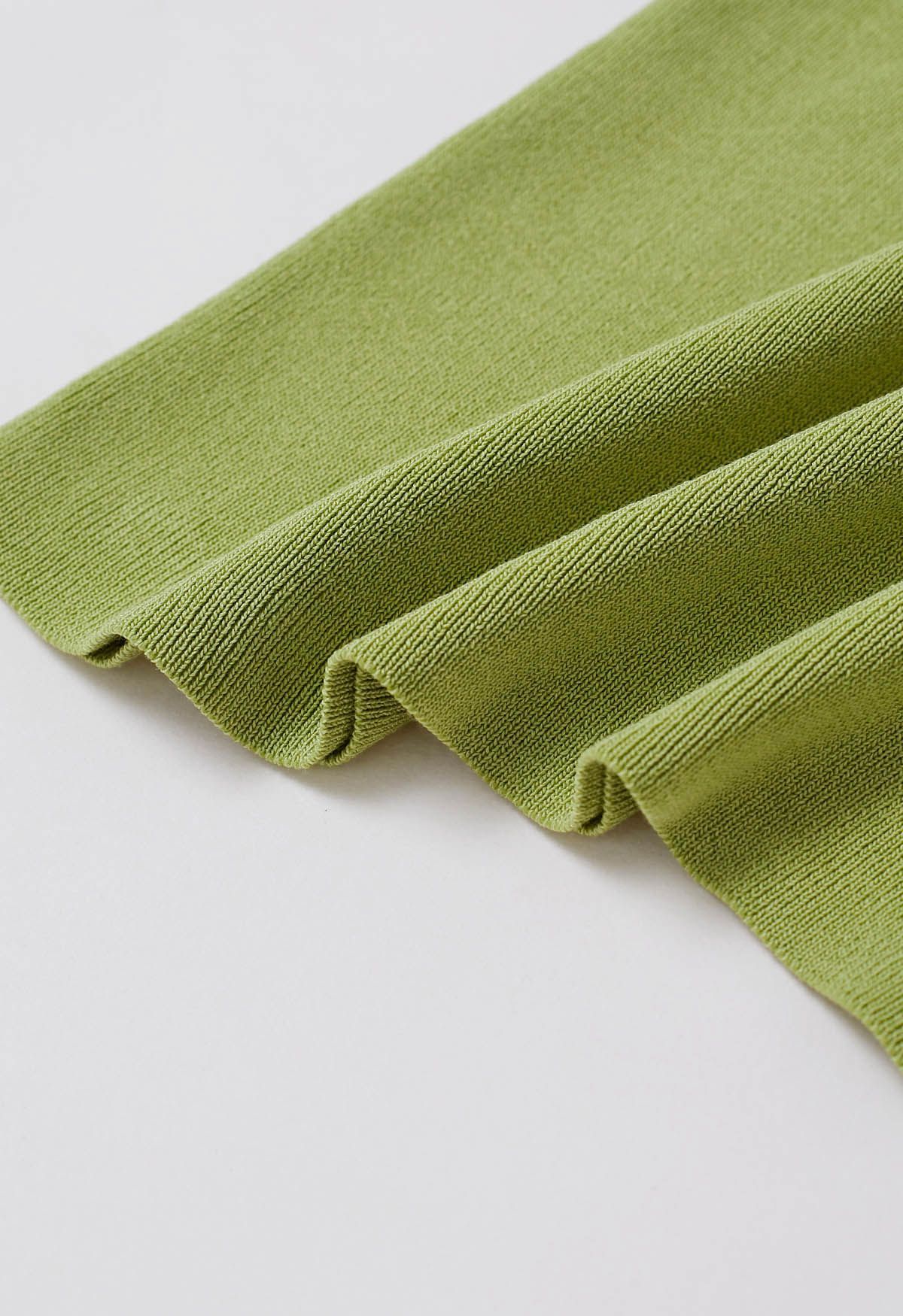 Haut en tricot à une épaule perlé en vert