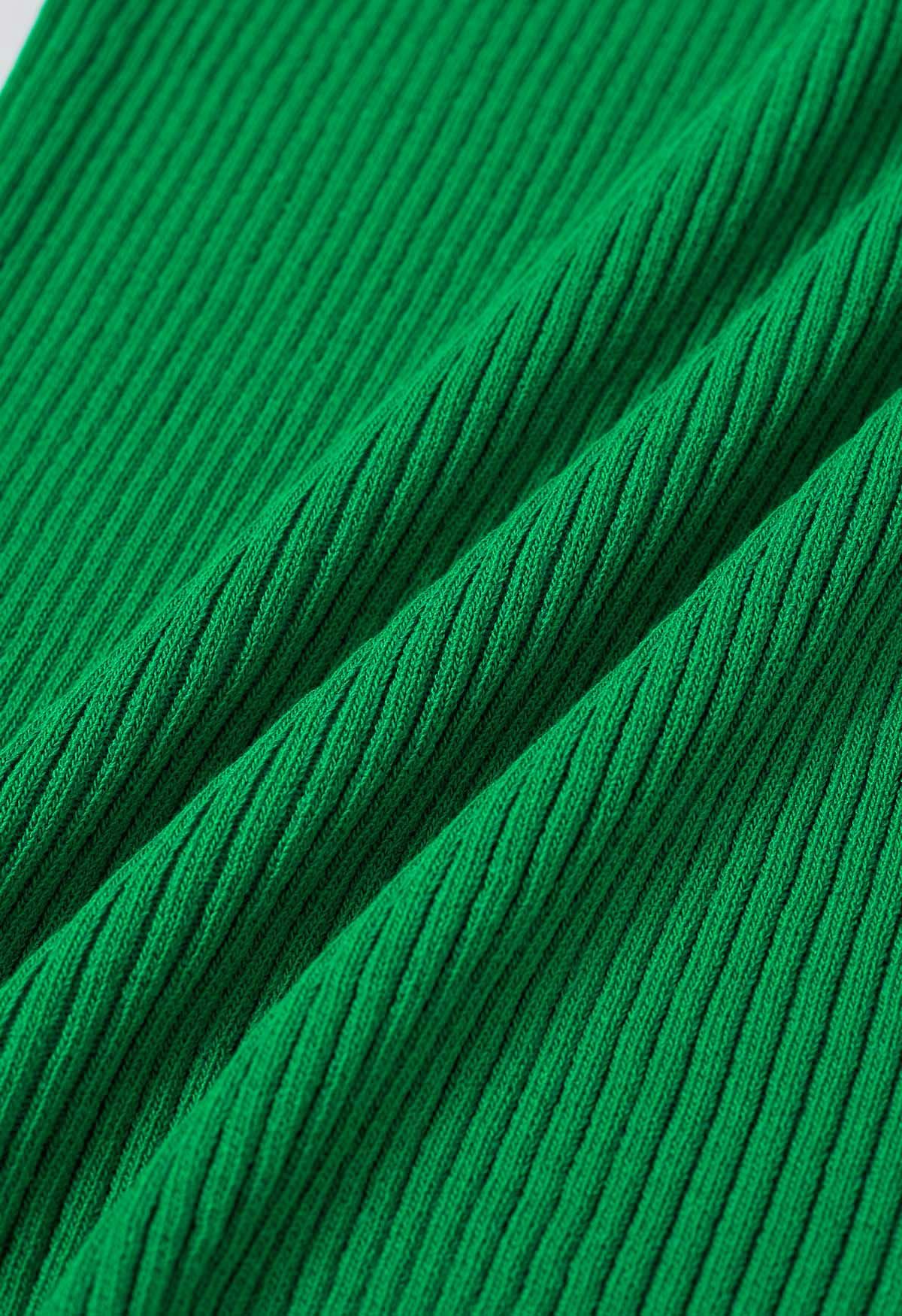 Haut en tricot dos nu à décor de perles en bois en vert