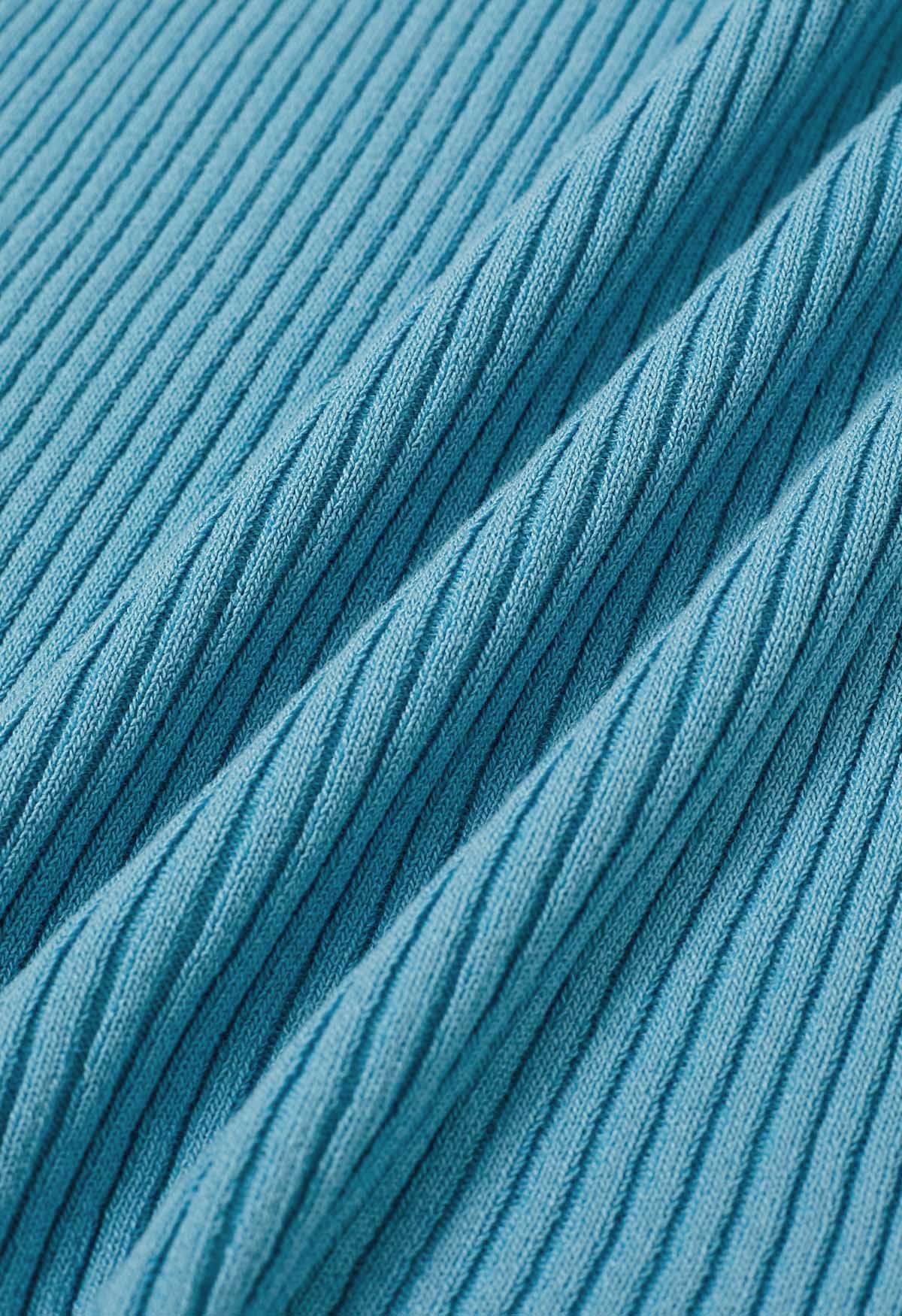 Haut en tricot dos nu à décor de perles en bois en bleu