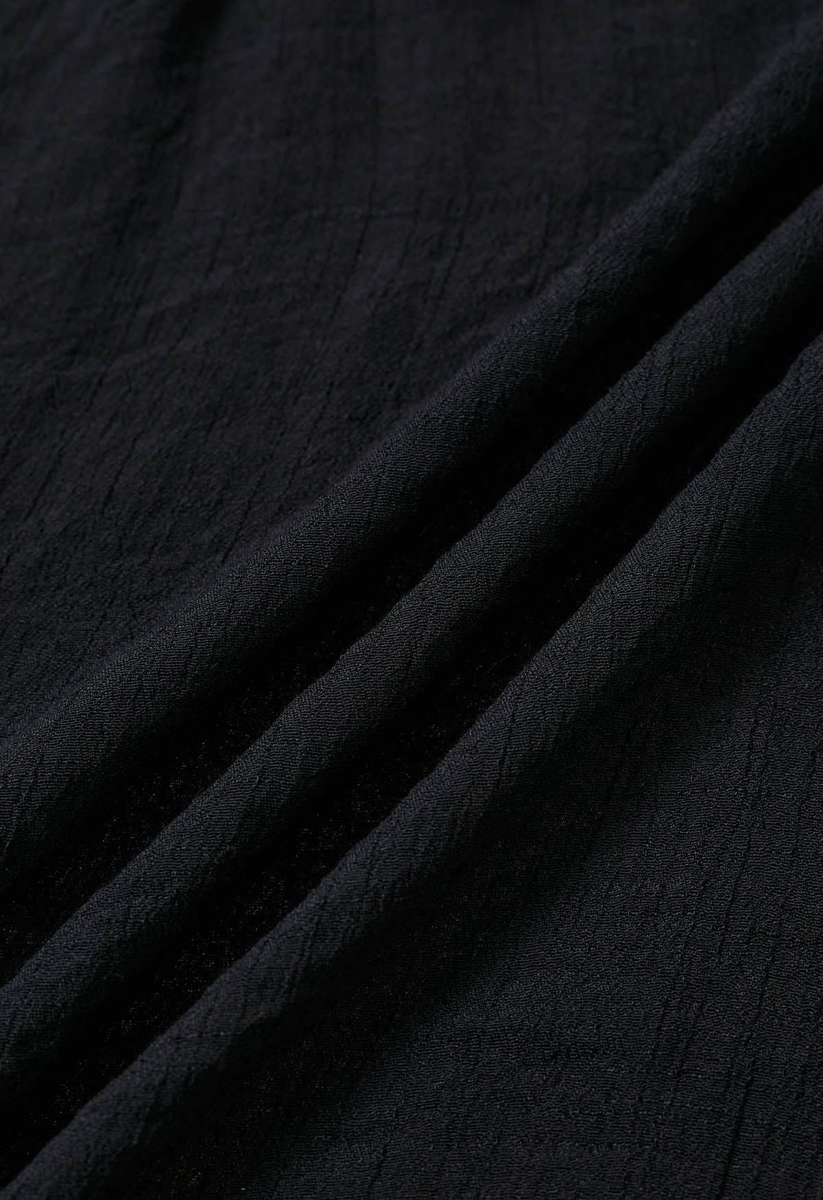 Robe cache-maillot dos nu au crochet papillon en noir