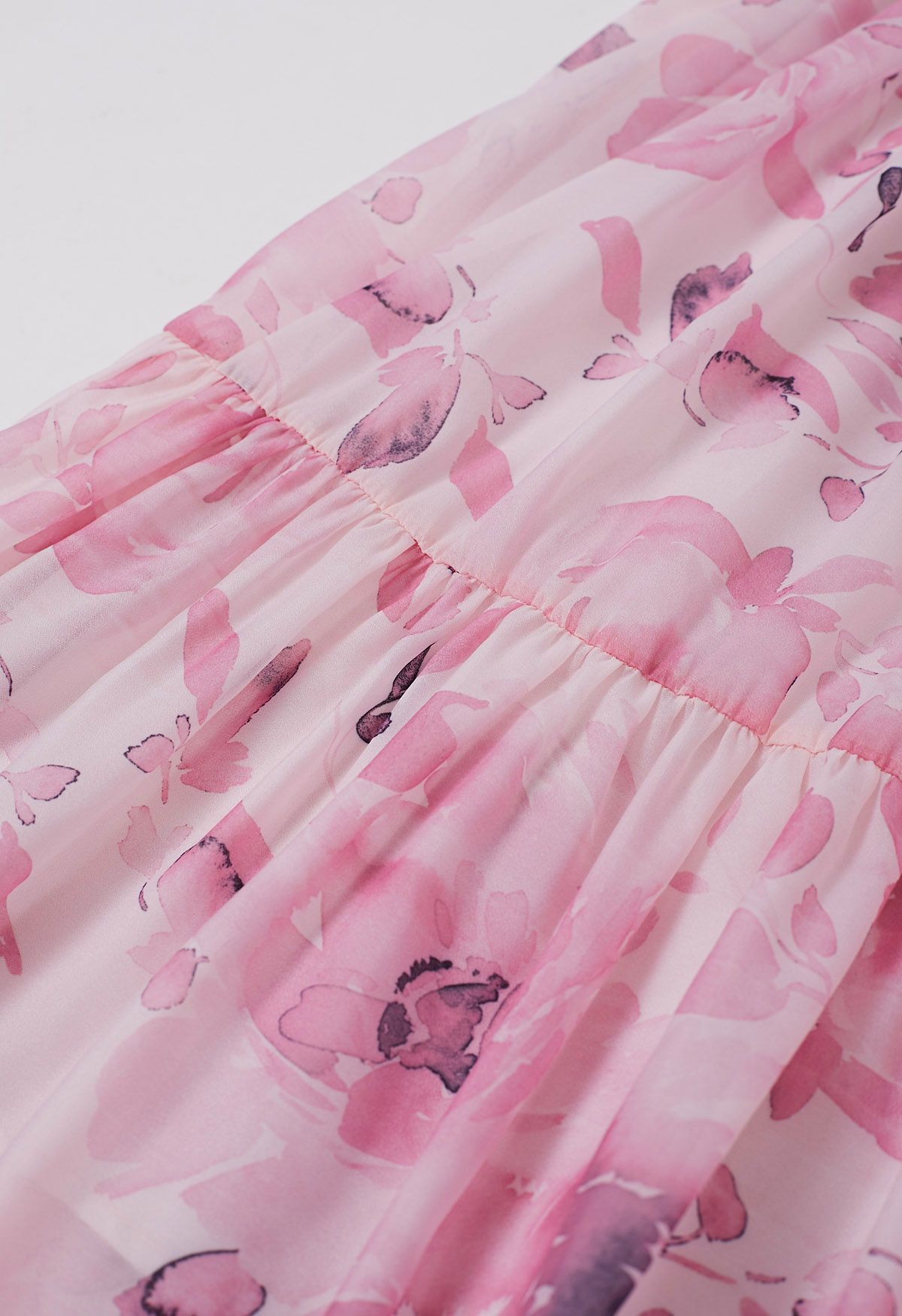 Robe longue florale à col licou et nouée à la taille en rose