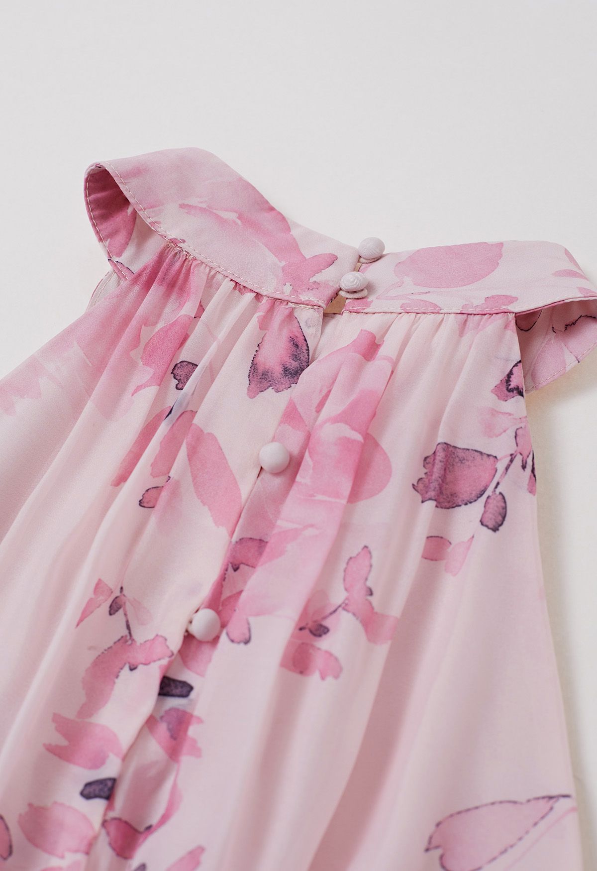 Robe longue florale à col licou et nouée à la taille en rose