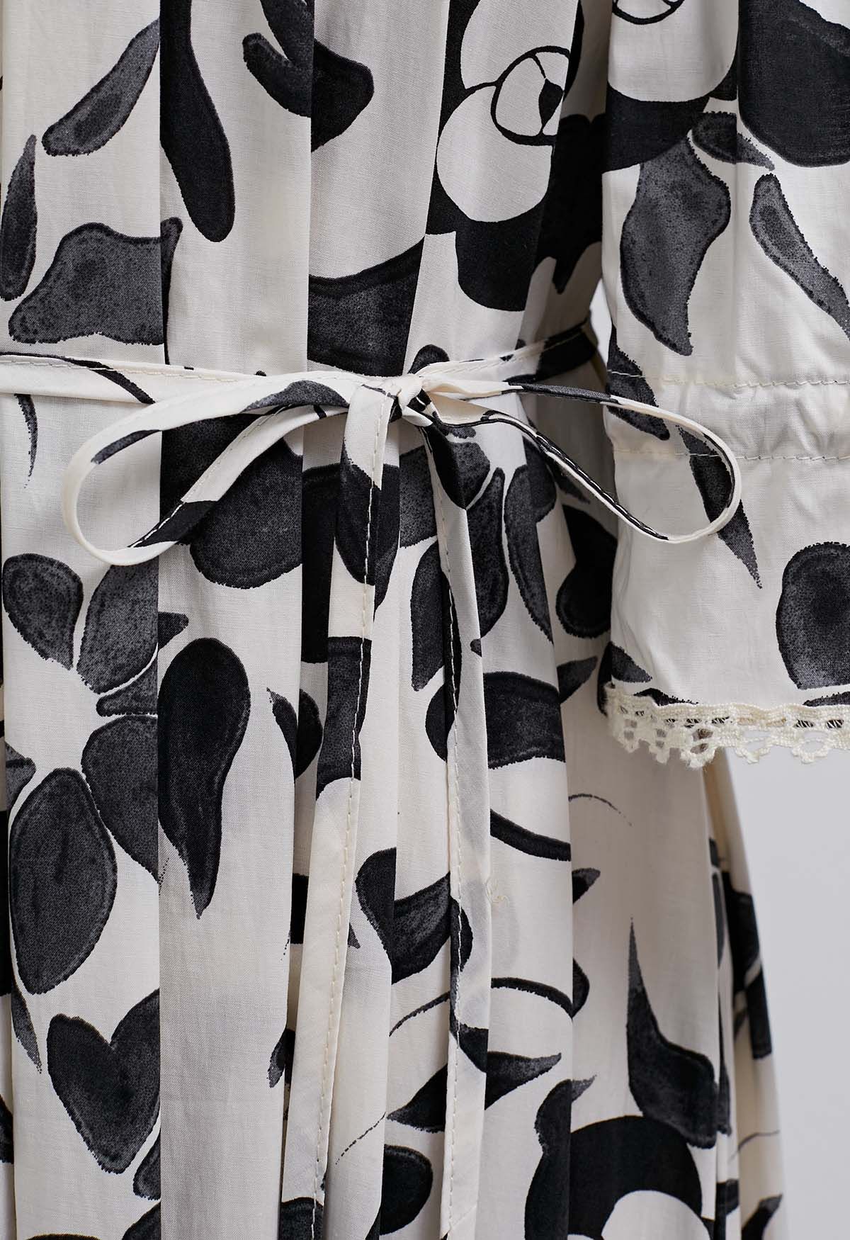 Robe en coton à volants et épaules dénudées à fleurs noires