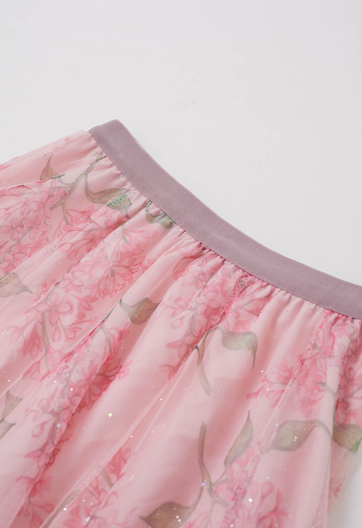 Jupe mi-longue en tulle à fleurs scintillantes en rose