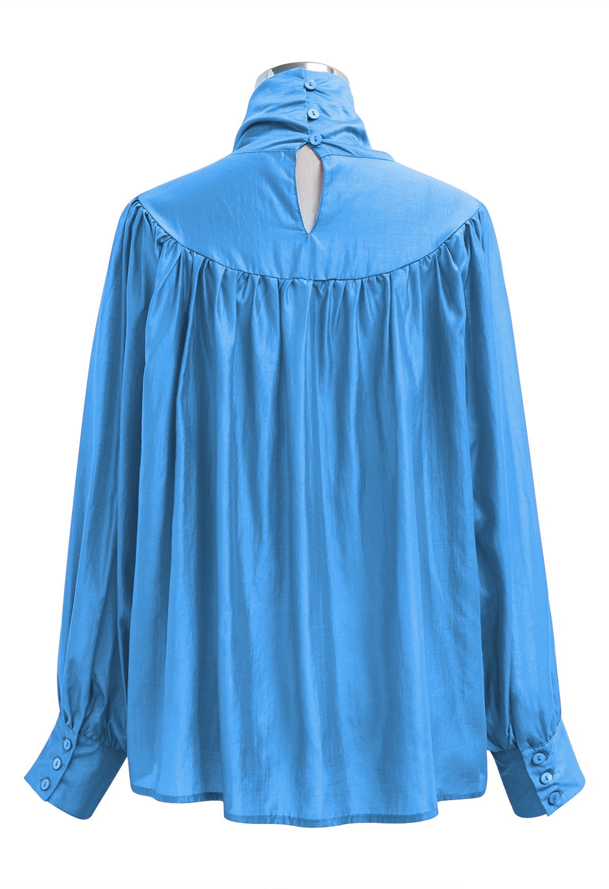 Charmante chemise transparente à manches bouffantes et nœud papillon en bleu