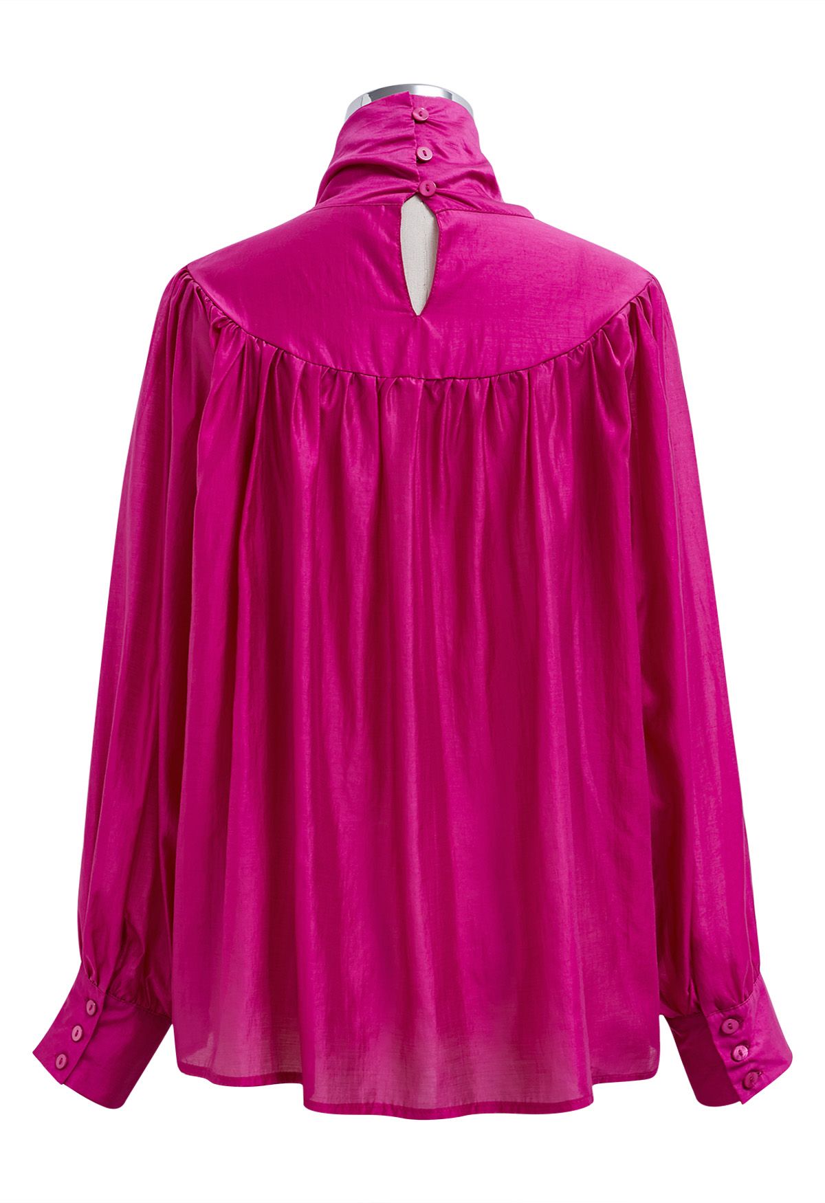 Charmante chemise transparente à manches bouffantes et nœud papillon en rose vif