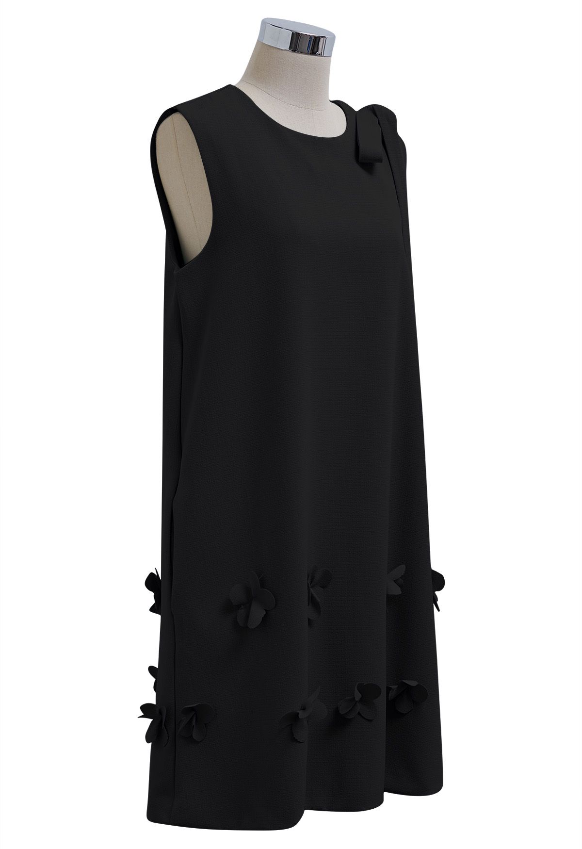 Robe sans manches avec nœud papillon et appliques de fleurs en noir