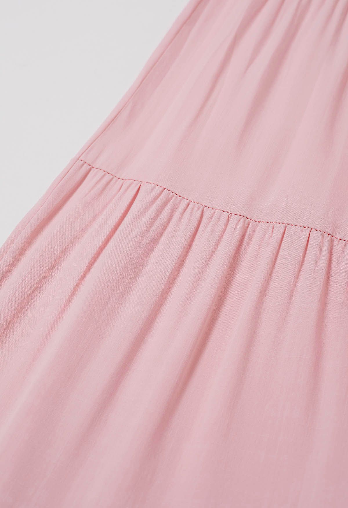 Robe longue froncée à épaules nouées flottantes en rose