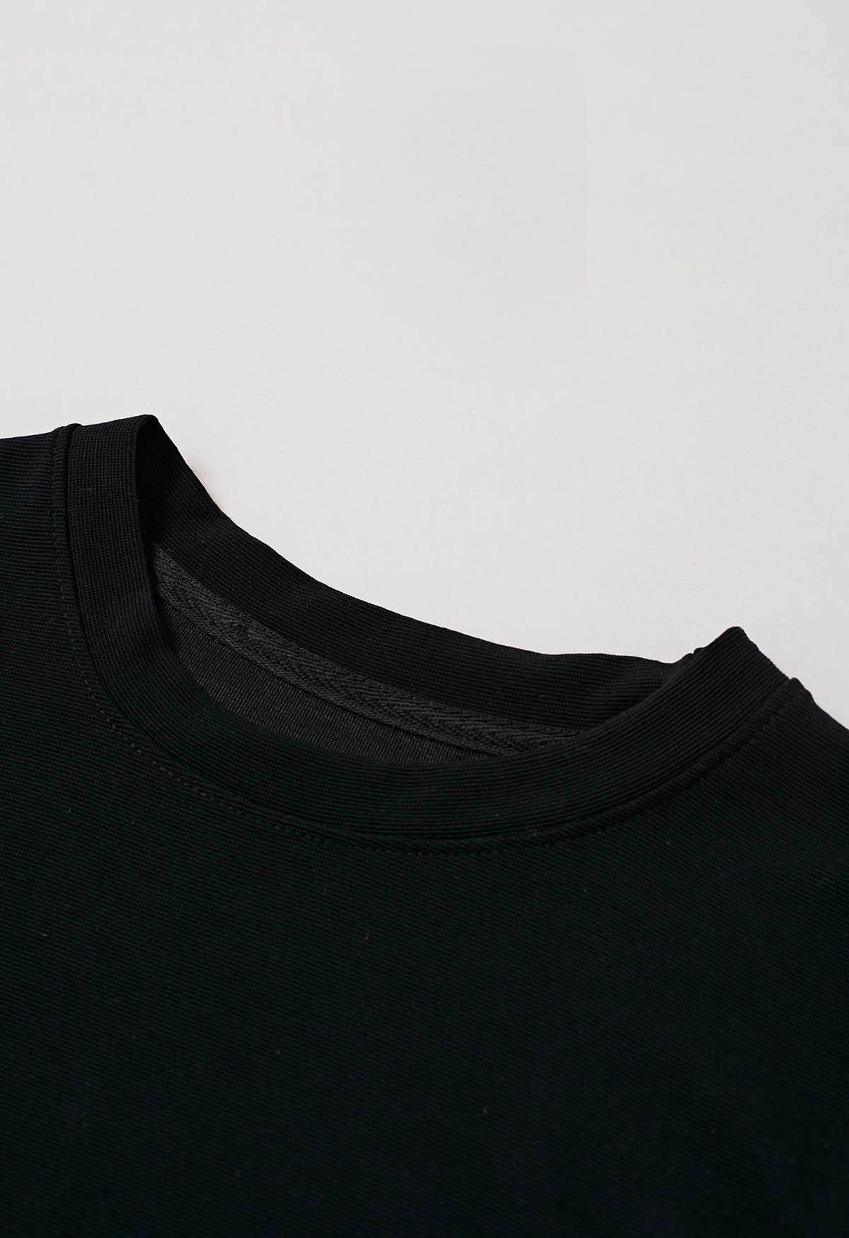 T-shirt à manches courtes avec détail torsadé en noir