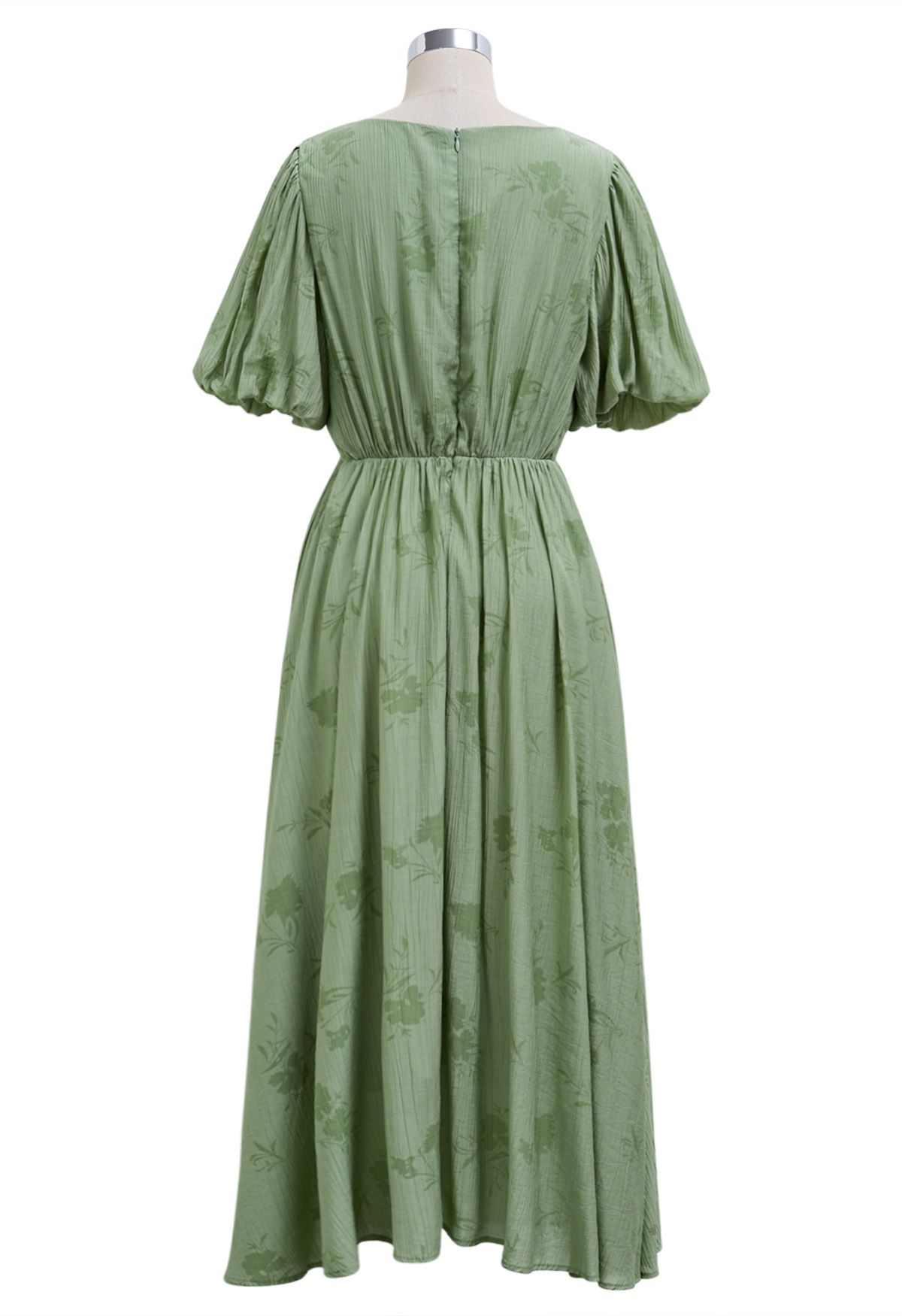 Robe mi-longue à col en V avec cordon de serrage et texture florale subtile en vert