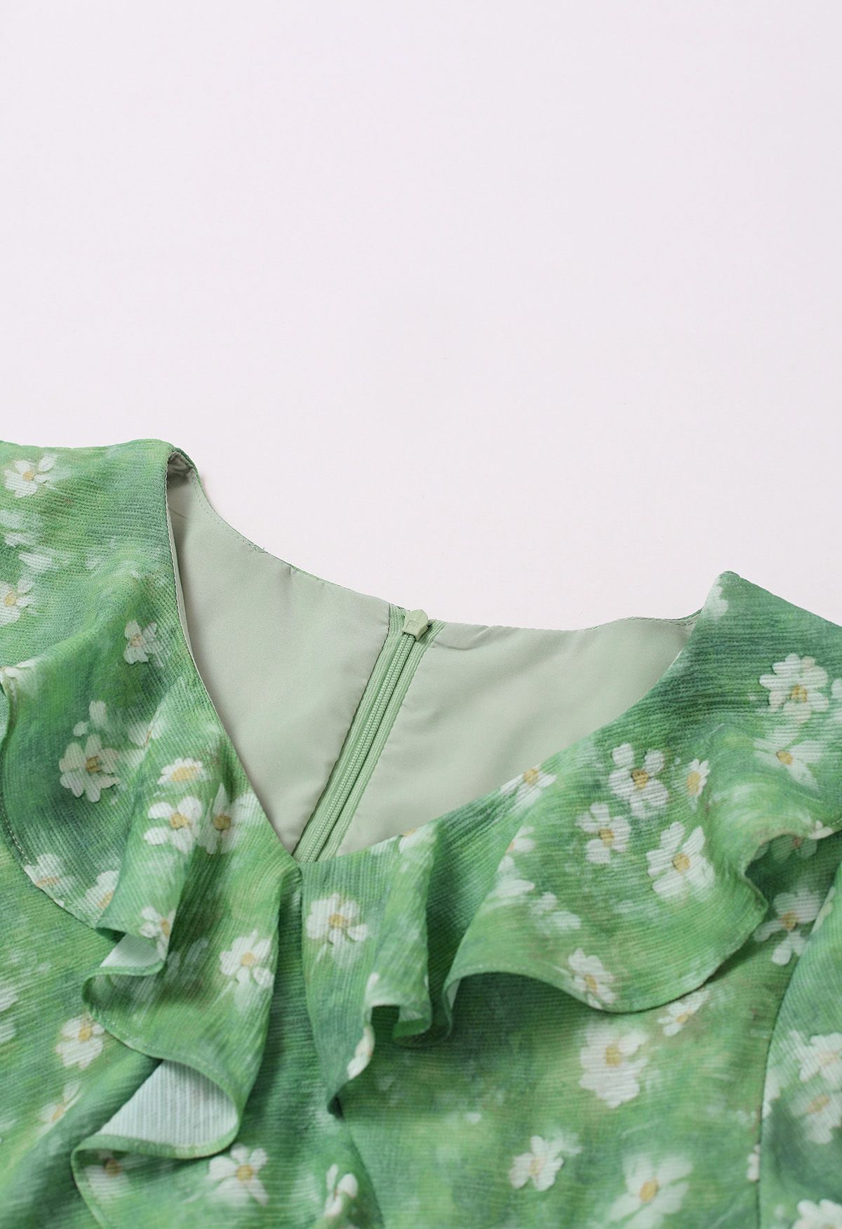 Robe longue à volants et imprimé marguerite en vert