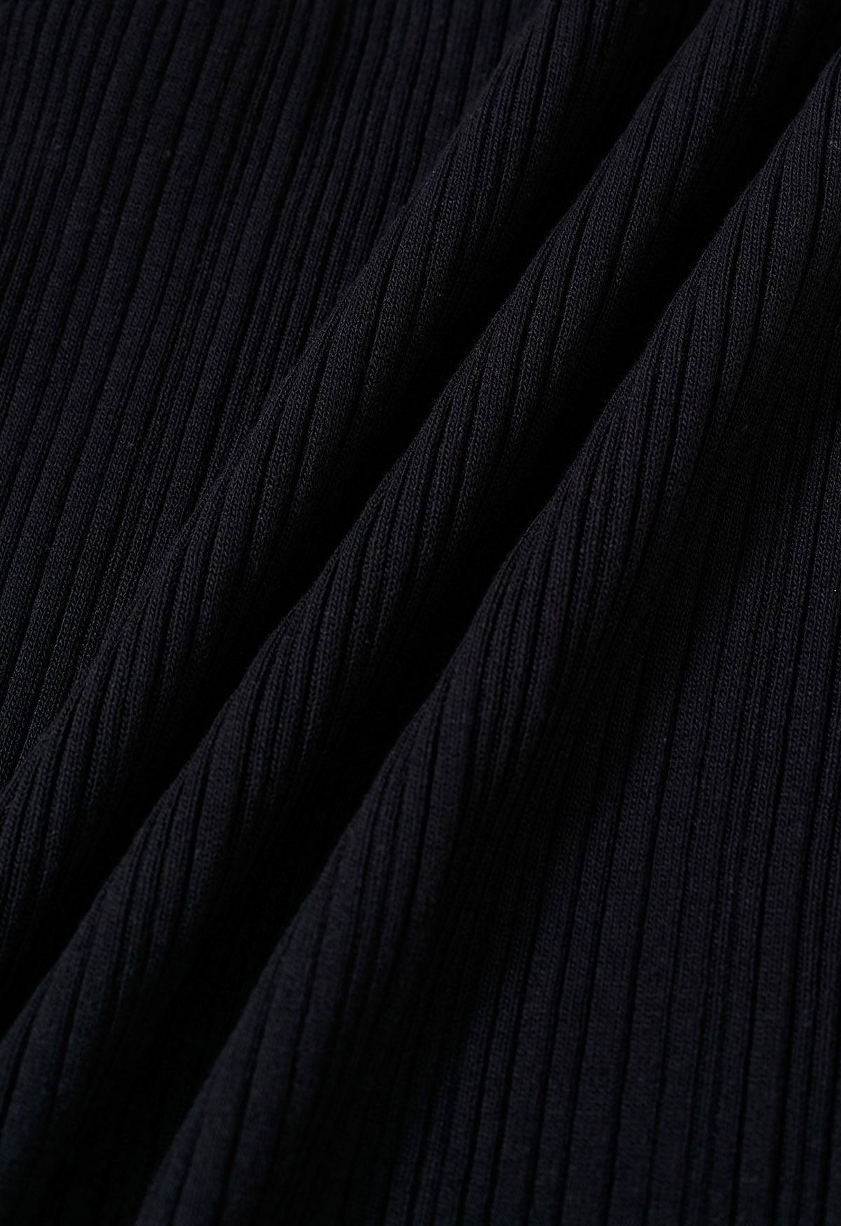 Haut en tricot sans manches à texture côtelée minimaliste en noir