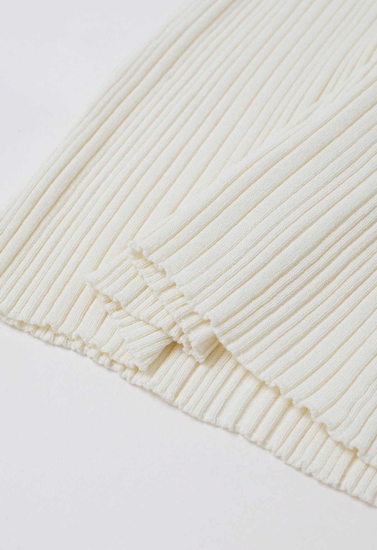 Haut en tricot sans manches à texture côtelée minimaliste en crème