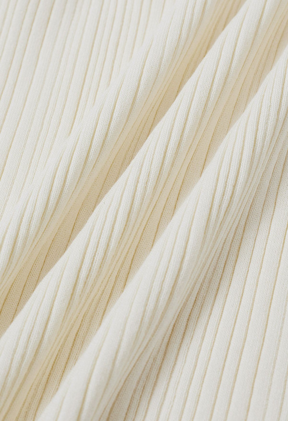 Haut en tricot sans manches à texture côtelée minimaliste en crème