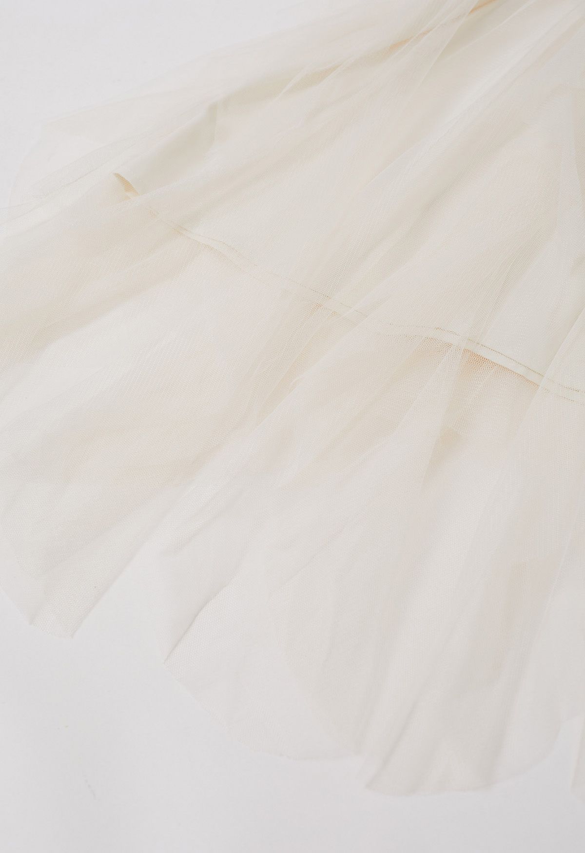 Robe caraco en tulle à détail torsadé en crème