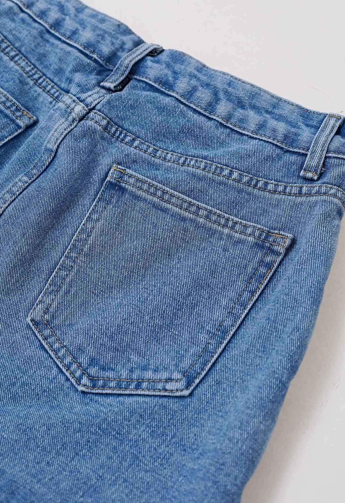 Jupe-short moderne en jean avec poche à rabat en bleu