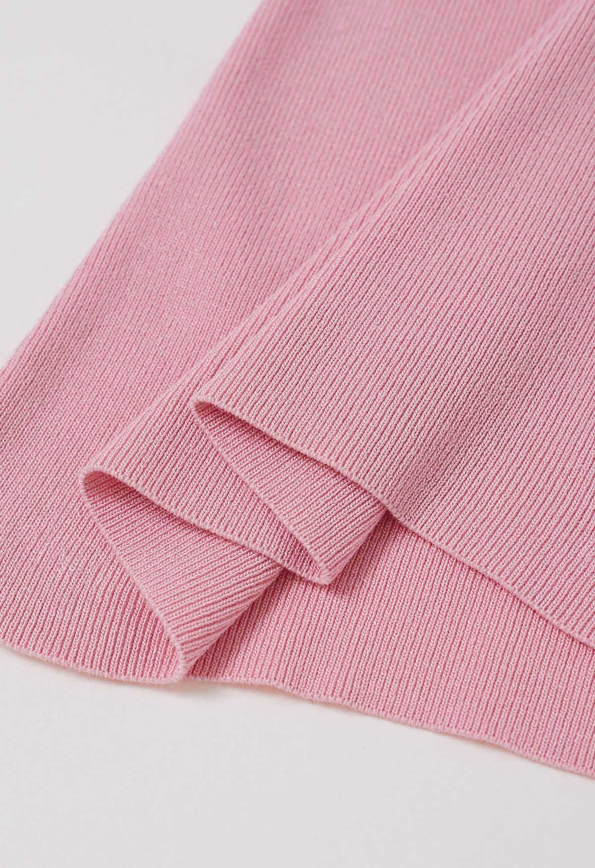 Haut en tricot à une épaule en forme de U à décor métallique en rose