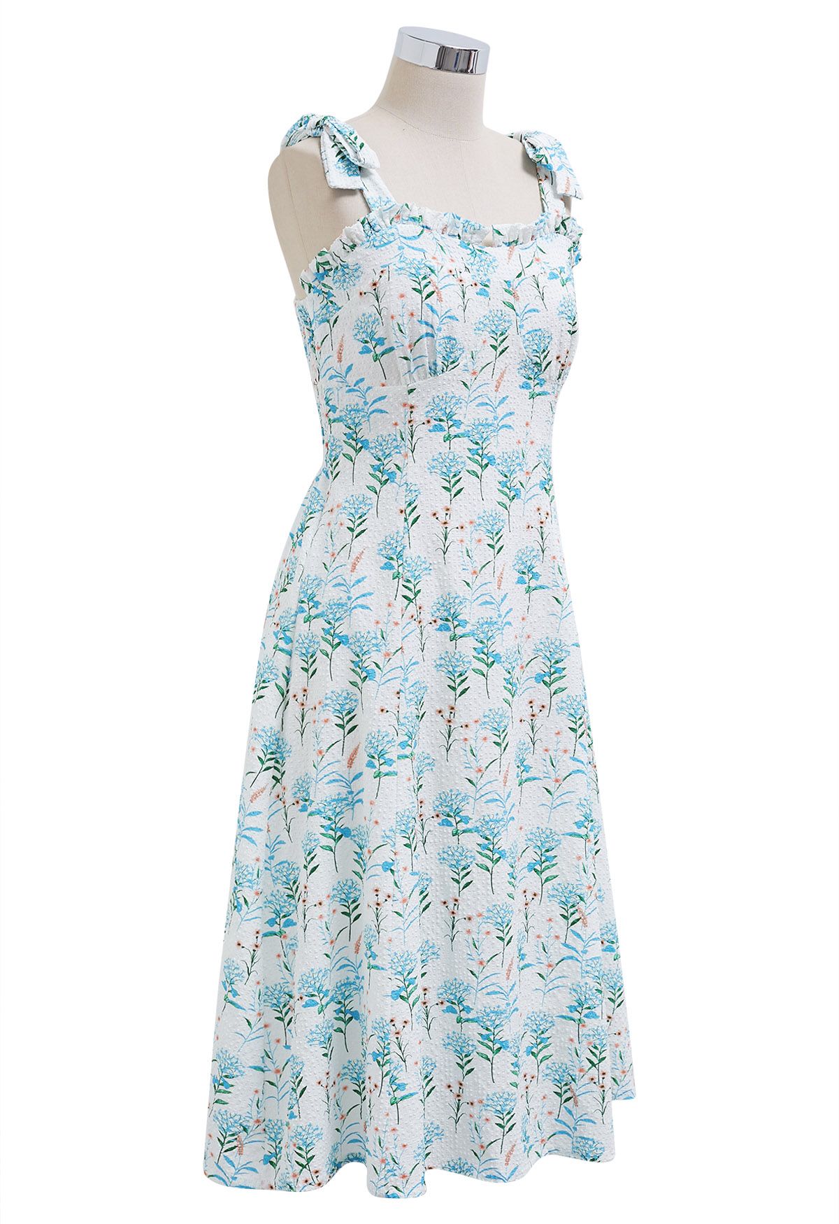 Robe midi bleue en relief à bretelles nouées et imprimé floral