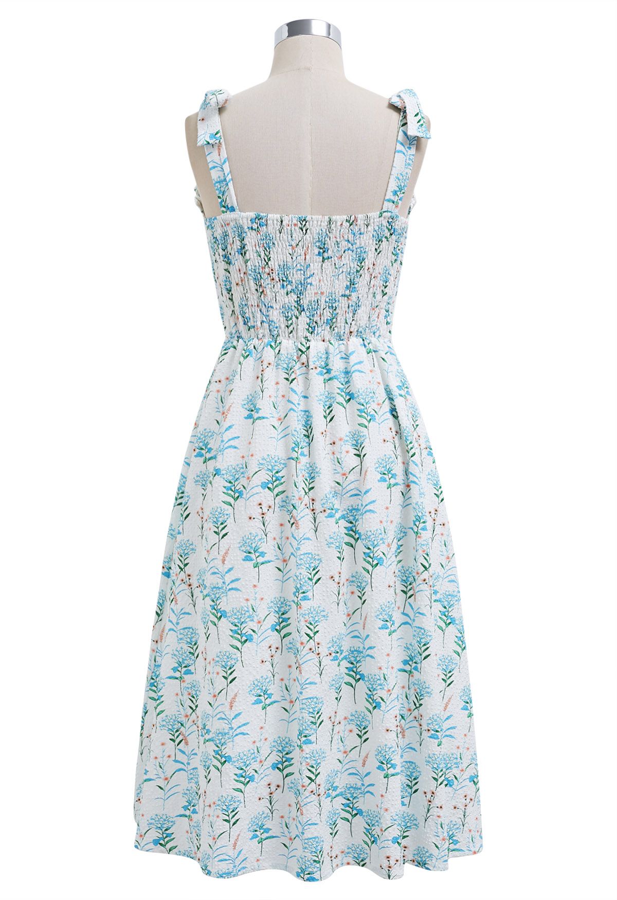 Robe midi bleue en relief à bretelles nouées et imprimé floral