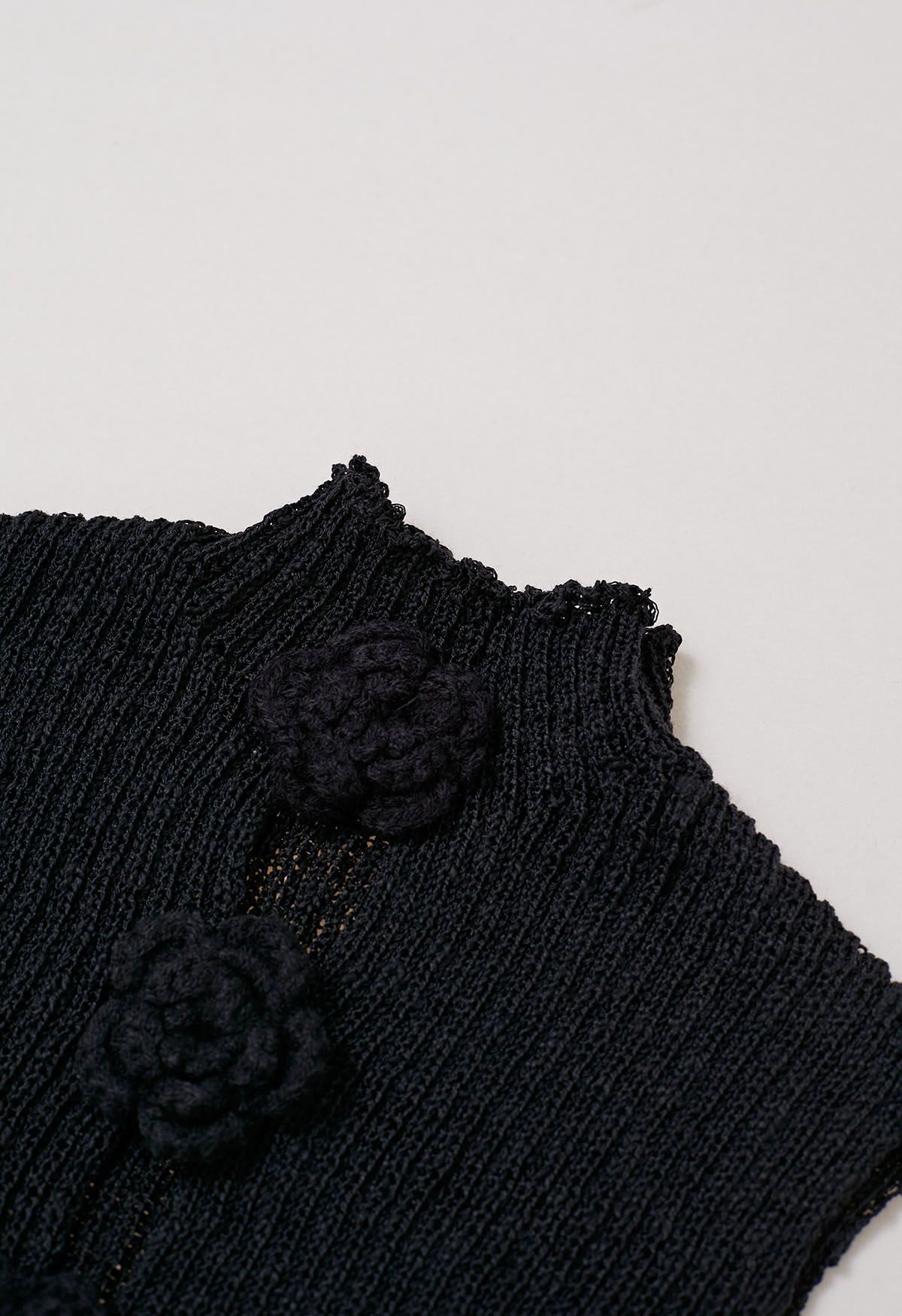 Haut en tricot sans manches à fleurs au crochet 3D en noir