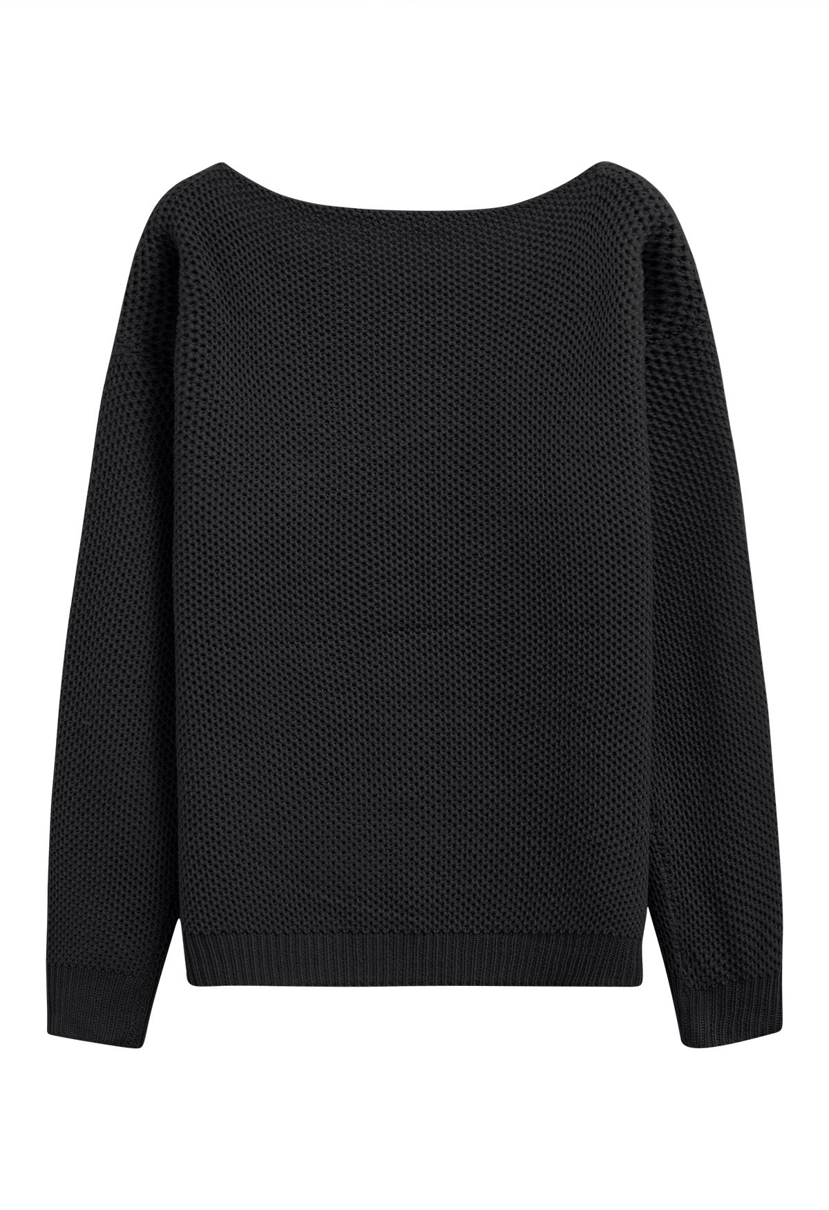 Pull en tricot gaufré boutonné avec poche plaquée en noir