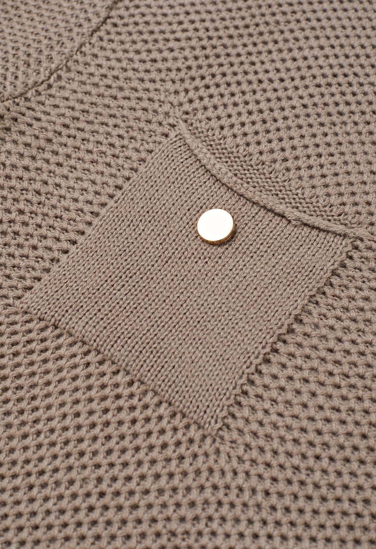 Pull en tricot gaufré boutonné avec poche plaquée en kaki